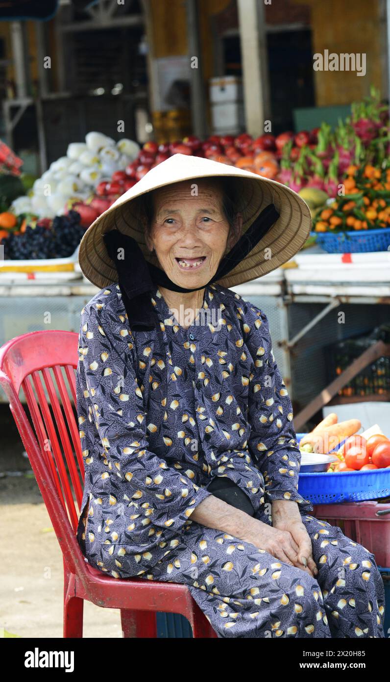 Portrait of an elderly Vietnamese woman taken at a local market in Hội An, Vietnam. Stock Photo