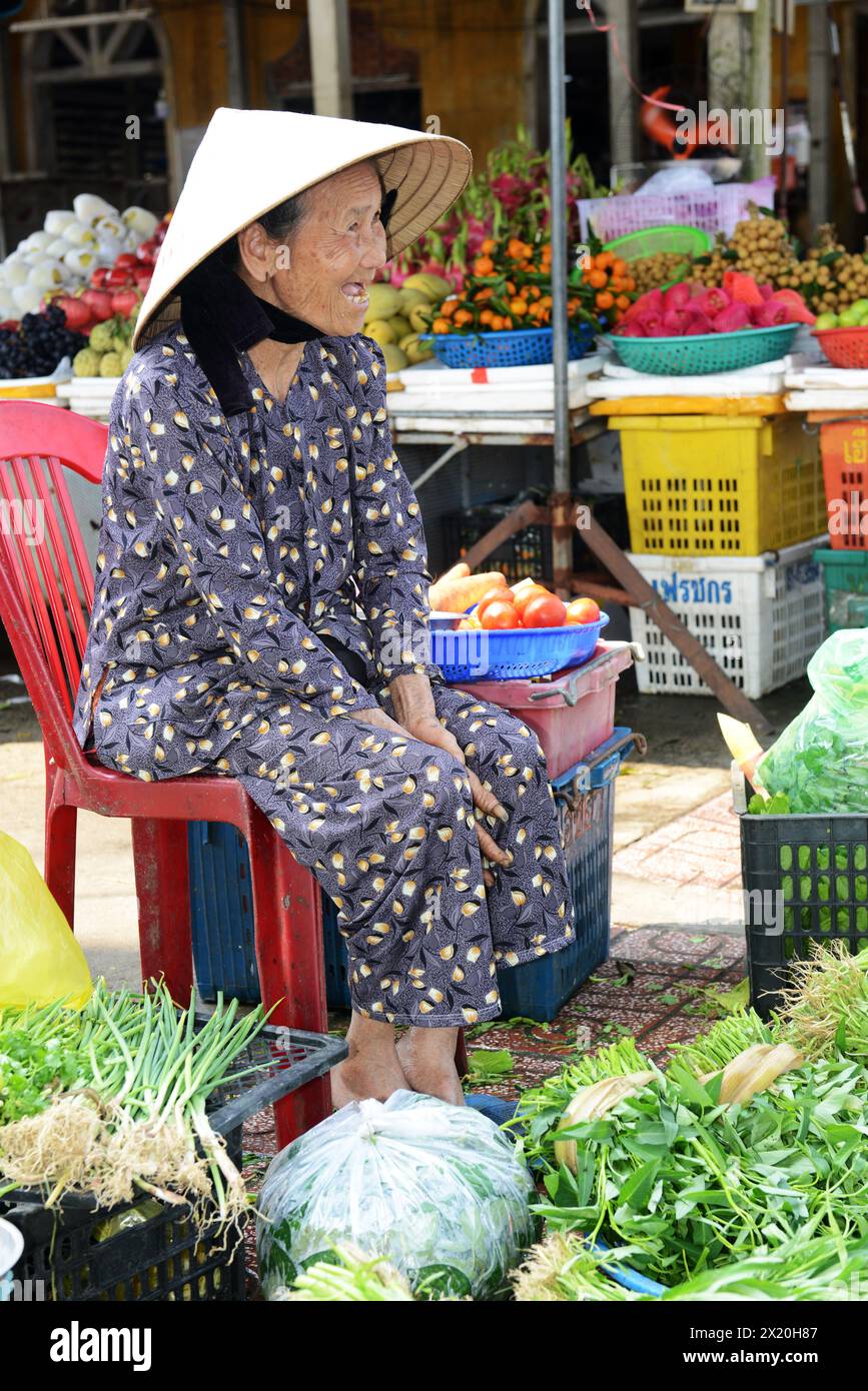 Portrait of an elderly Vietnamese woman taken at a local market in Hội An, Vietnam. Stock Photo