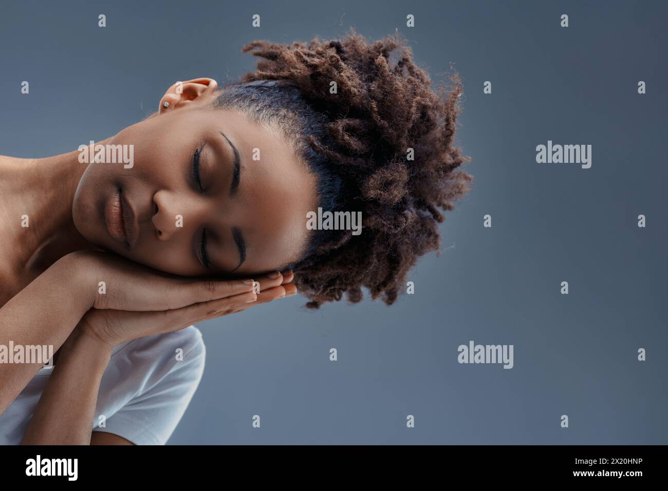 Resting Head Woman resting head on hands hi-res stock photography and images - Alamy