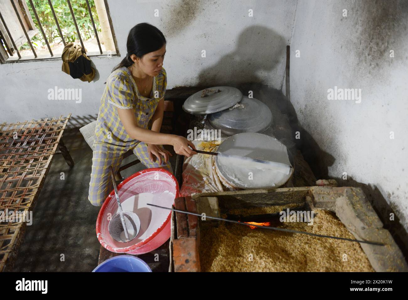Traditional rice noodle production in a small family business on Cam Kim Island, Hoi An, Vietnam. Stock Photo