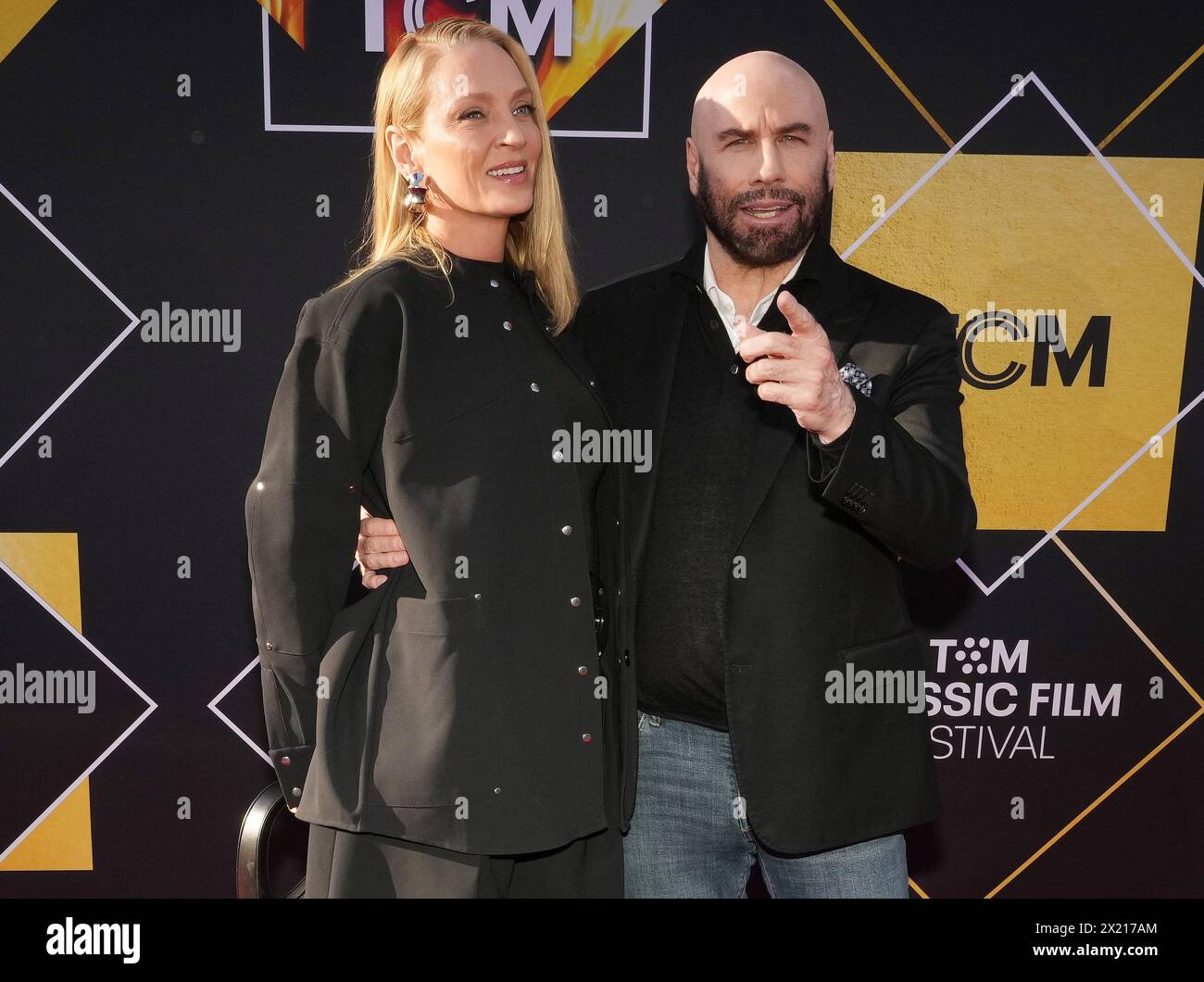 Los Angeles, USA. 18th Apr, 2024. (L-R) Uma Thurman and John Travolta at the 2024 TCM Classic Film Festival Opening Night of PULP FICTION held at the TCL Chinese Theatre in Hollywood, CA on Thursday, ?April 18, 2024. (Photo By Sthanlee B. Mirador/Sipa USA) Credit: Sipa USA/Alamy Live News Stock Photo