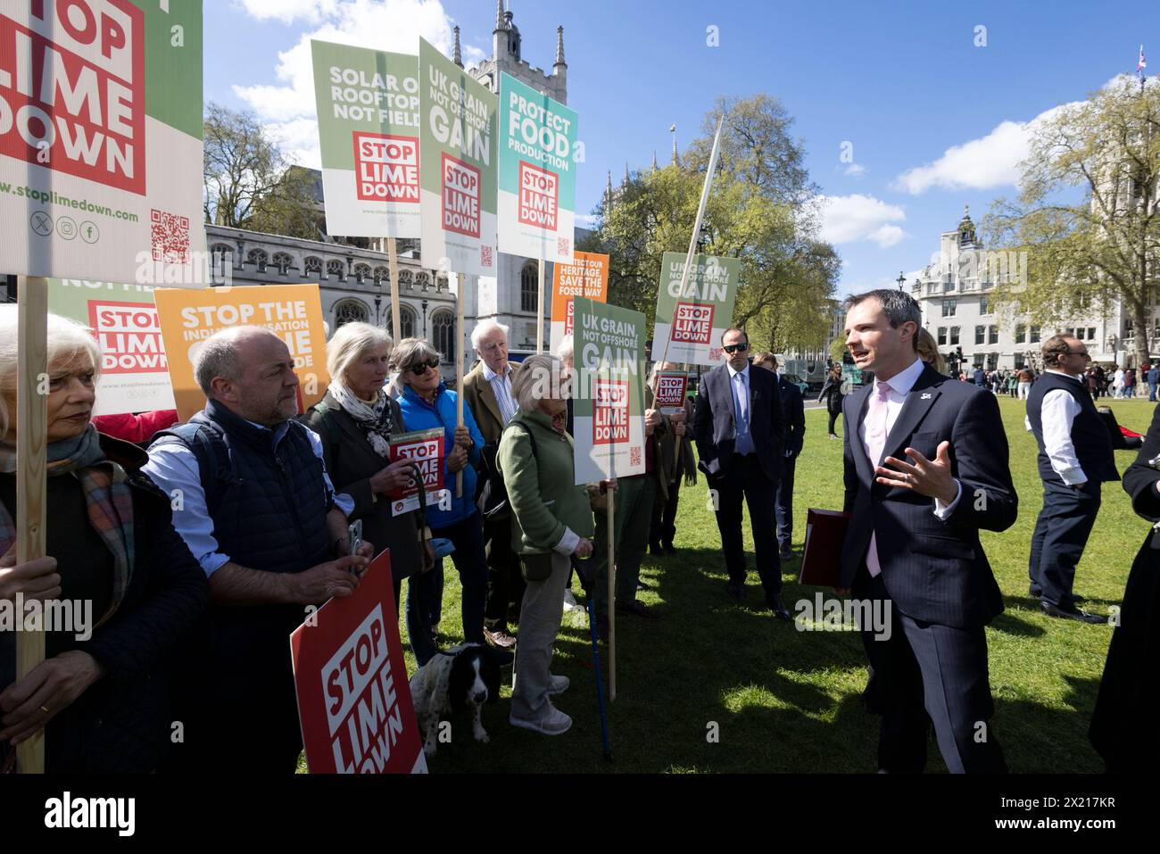 Campaigners staging a rally in Westminster in order to protect food production and nature from industrial-size solar farms, Parliament Square, London. Stock Photo