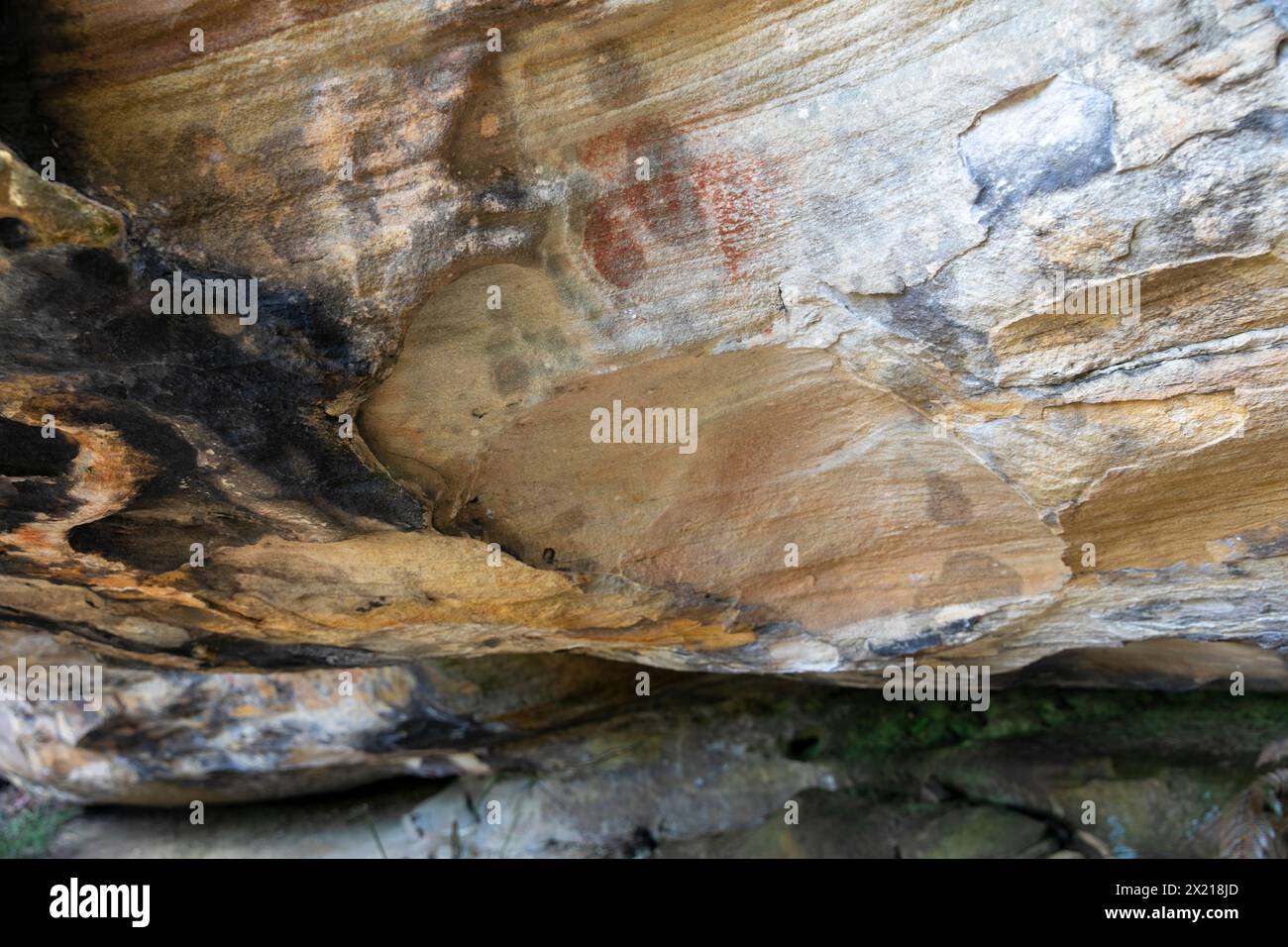 Red Hands cave site, aboriginal art work from some 30000 years ago, West Head,Ku-Ring-Gai chase national park,Sydney,NSW,Australia Stock Photo
