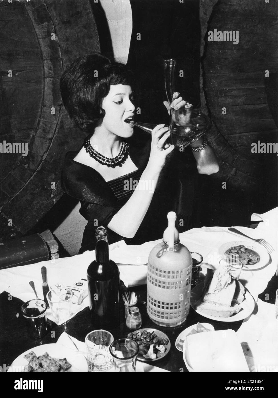 Steffen, Anita, German model, Miss Germany, drinking vine, Palma de Majorca, 1963, ADDITIONAL-RIGHTS-CLEARANCE-INFO-NOT-AVAILABLE Stock Photo