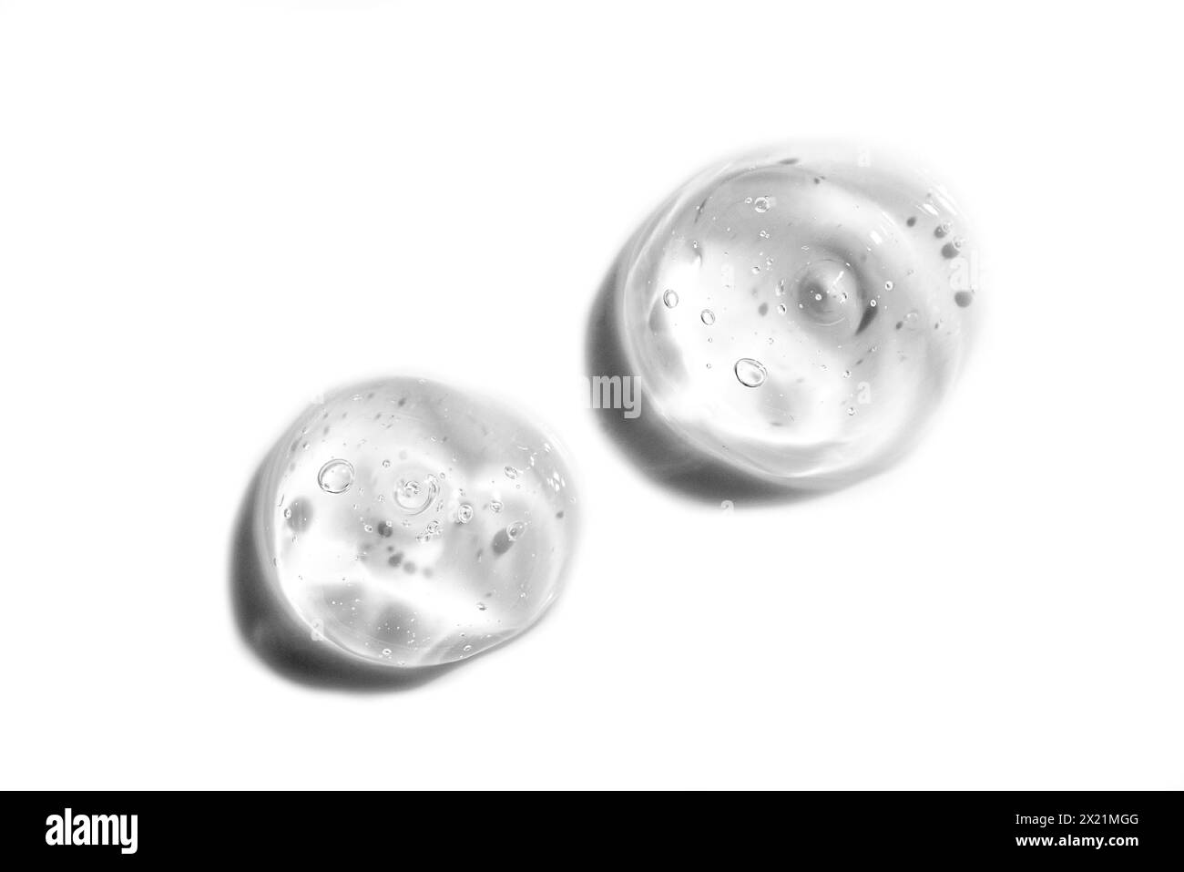 Clear gel drops  isolated on white background. Glycerin or cilicone transparent gel sample, design element. Medical or beauty product swatch. Stock Photo