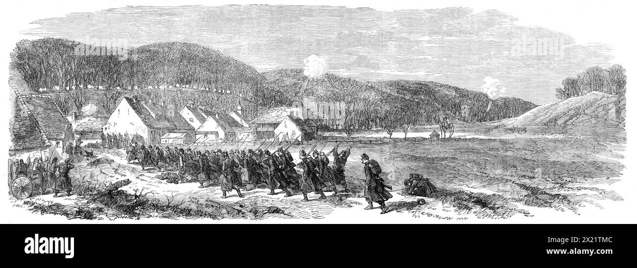 Illustrations of the War in Denmark: fight between the Danes and the Austrians at Veile on the 8th of March, 1864. '...the Austrian infantry regiment of Hesse was sent...across the frozen swamp above the town, to gain the bridge over a little river called the Veile Aa...The Danes fell back, leaving the town, and then took their stand on the steep wooded heights where their artillery was posted, on the north side of Veile. There are a few poor houses at the end of the town, close under the hill, which is the place shown in our Artist's sketch. Along the top of this hill, where the smoke of musk Stock Photo