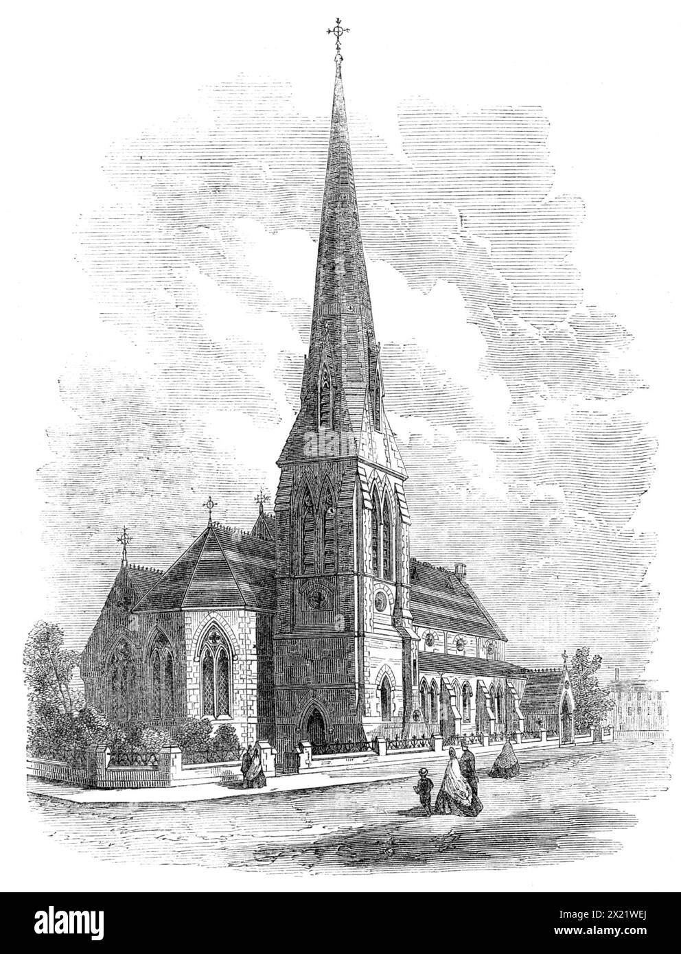 The new church of St. Stephen, Carlisle, built by Miss Burdett Coutts, 1865. 'The exterior presents an agreeable contrast of colour, by the judicious use of red and white stone. The general style of architecture is geometric Gothic...The most striking feature is the square tower at the James-street end...On the north side of the church, in Hewson-street, we find the main entrance to the church, and this is the side on which the building is seen to the best advantage. The entrance is by a porch, with a pitched roof, the doorway being a Gothic arch, with a dog-tooth moulding supported upon pilla Stock Photo