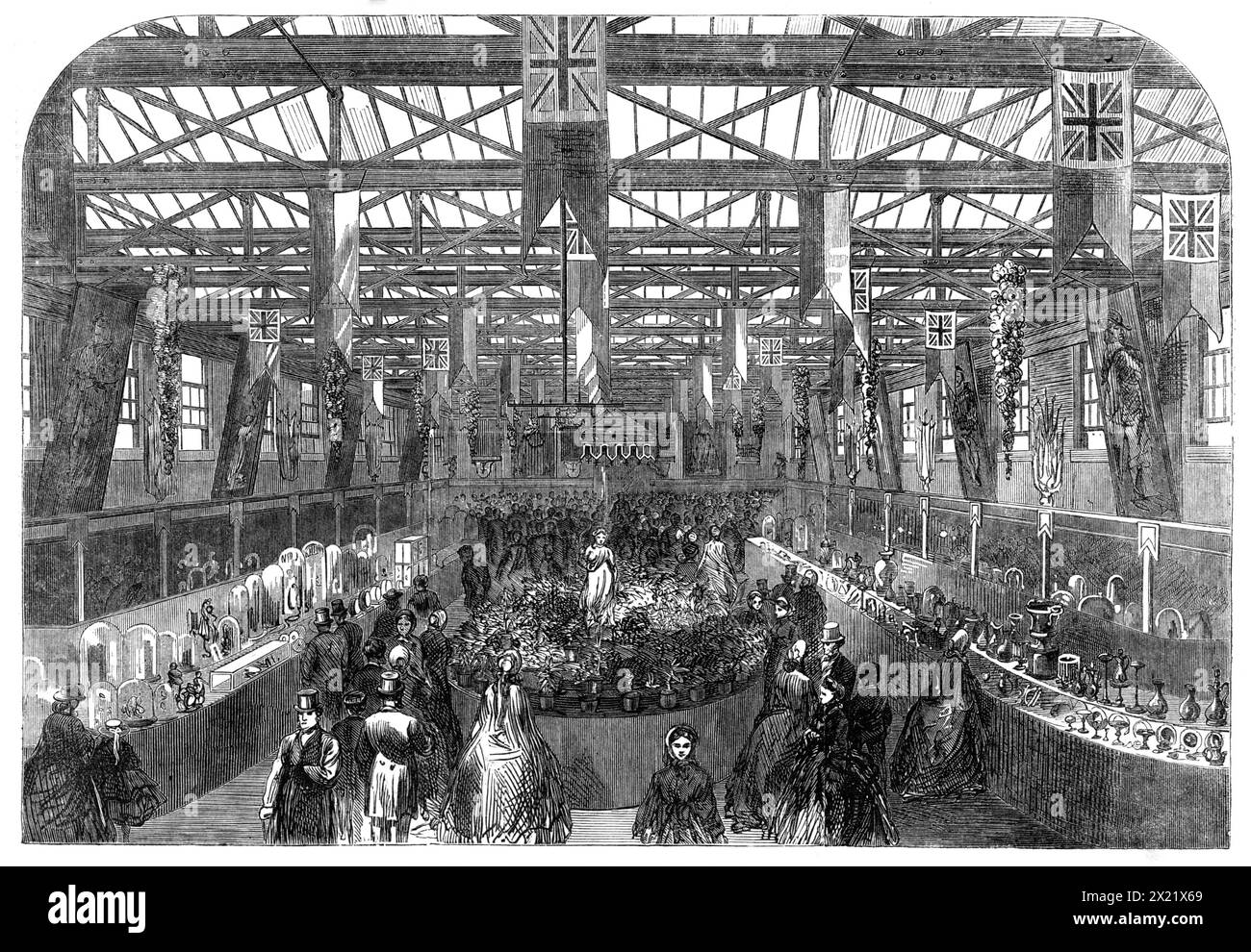 The Preston Exhibition of Works of Art and Industry, 1865. 'The Exhibition of Works of Art and Industry at Preston, Lancashire, which was...[held] in the Exchange Buildings, Lune-street, includes a picture-gallery, containing several valuable works of Landseer, Turner, Roberts, Frith, Hunt, and others, with a few pieces of sculpture; a collection of specimens of natural history, with scientific instruments and apparatus; mechanical models, machinery in motion; various manufactured products, chiefly of the textile fabrics; and a museum of antiquities and curiosities, mostly of local interest. T Stock Photo