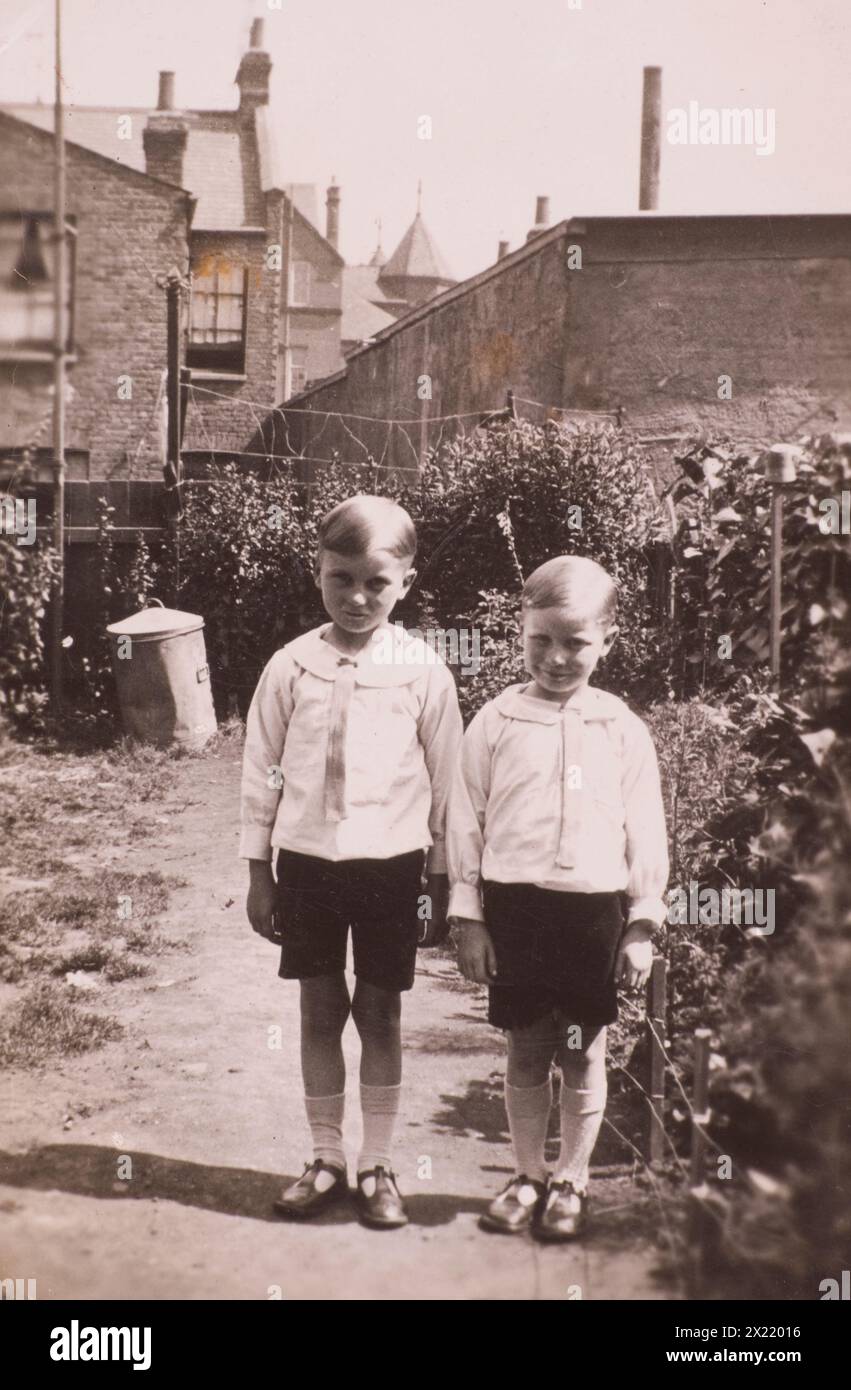 Two brothers dressed the same in the 1920s Stock Photo