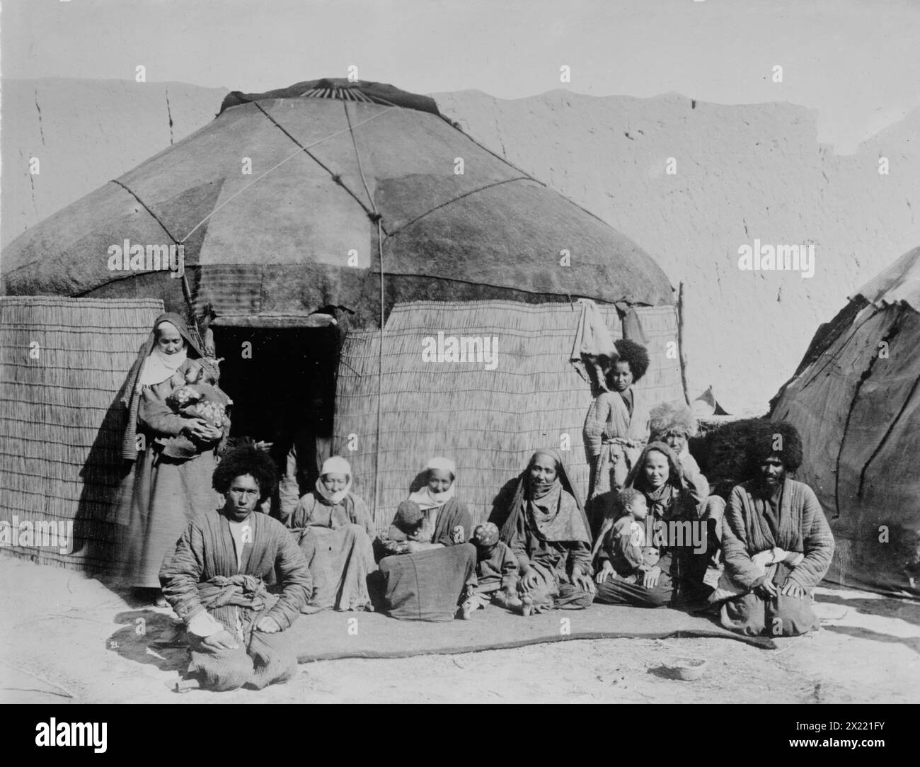 Afghan nomads, seated outside tent, 1919. Stock Photo