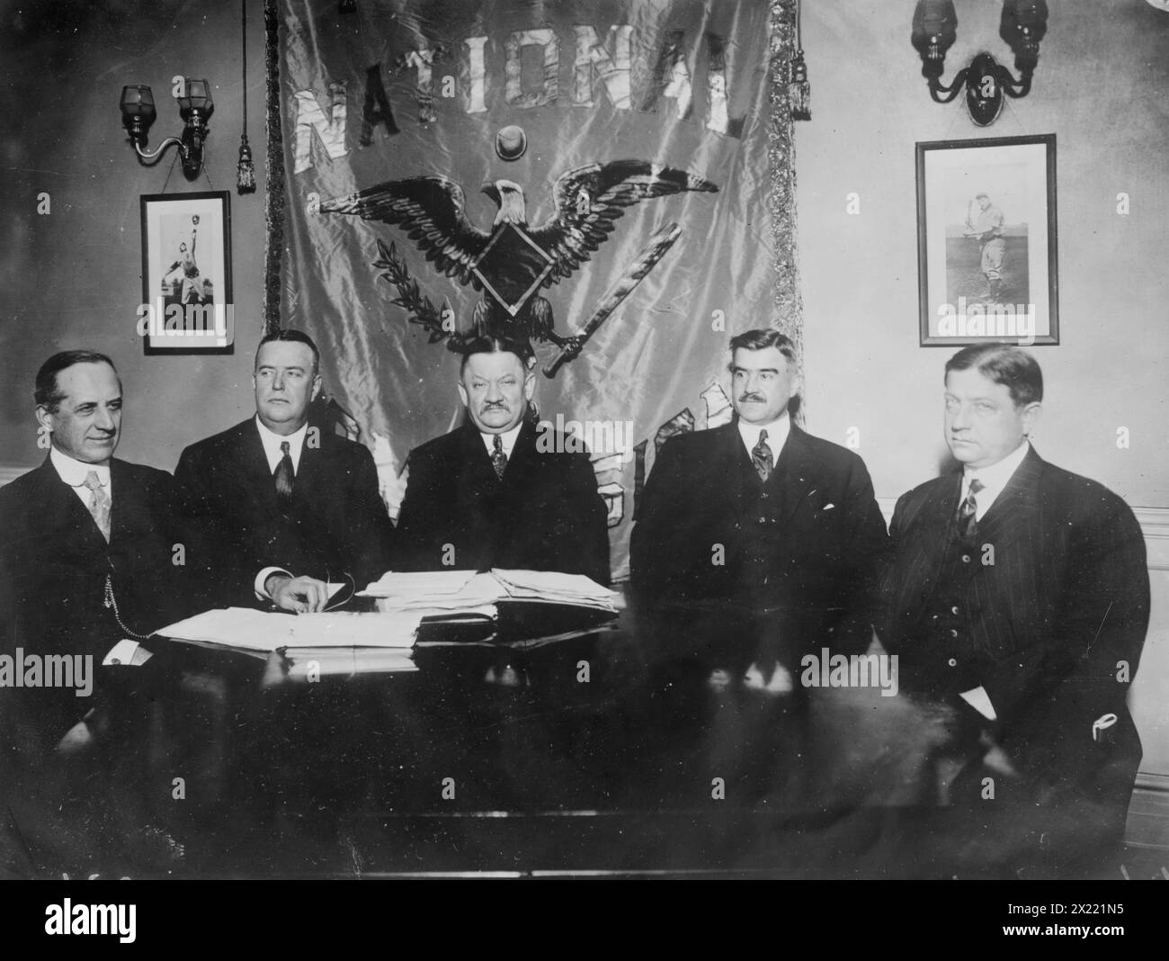 J.E. Bruce, Ban Johnson, A. Herrmann, T.J. Lynch, J.A. Heydler at table together, 1910. Stock Photo