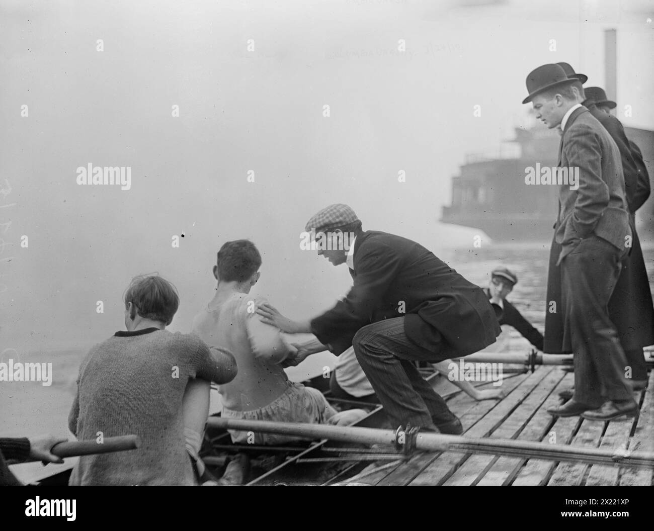Rice, coach of Columbia Varsity crew team instructing, 1910. Stock Photo