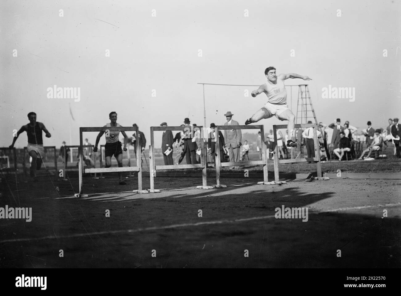 J.J. Eller wins 120 yd. Hurdle 1911, 1911. Shows John Jacob (&quot;Jack&quot;or J.J.) Eller, Jr. (1883-1967), an American track and field athlete competing in the 120 yard hurdle race, held Sept. 16, 1911, at Celtic Park in Queens, New York City. Stock Photo