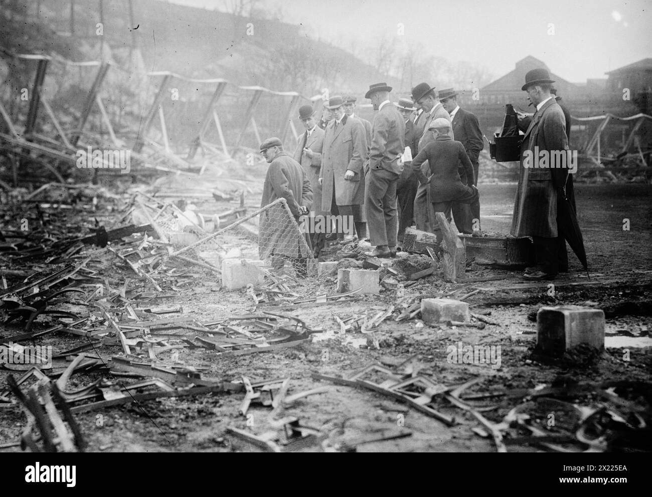 New York, NL &amp; Philadelphia, NL players view fire damage, Polo Grounds, 1911. Stock Photo