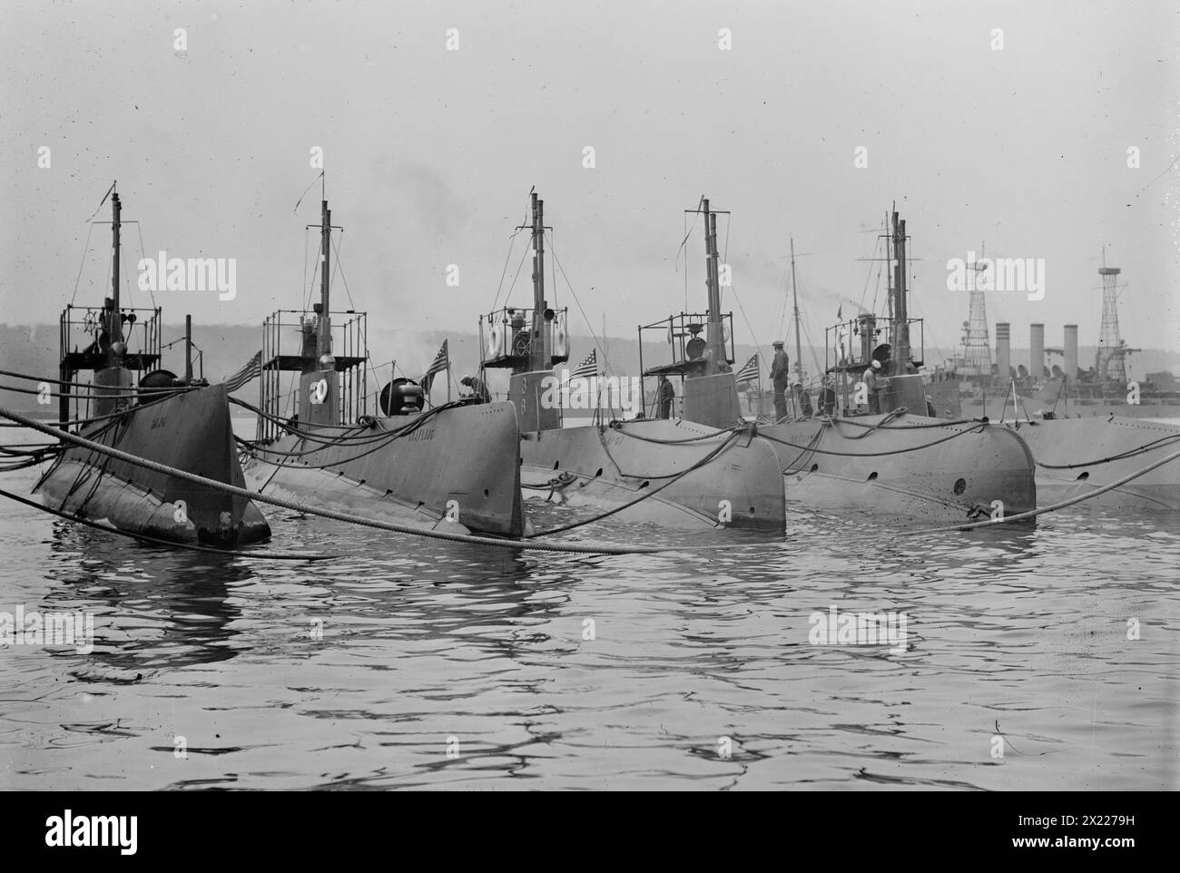 SALEM, GRAYLING, TARPON, OCTOPUS, BONITA, and NEBRASKA, 1911. Shows USS submarines participating in the 1911 naval review in New York city, with the Nebraska in the background. The name &quot;Salem&quot; is likely a typo for the name &quot;Salmon.&quot; Stock Photo