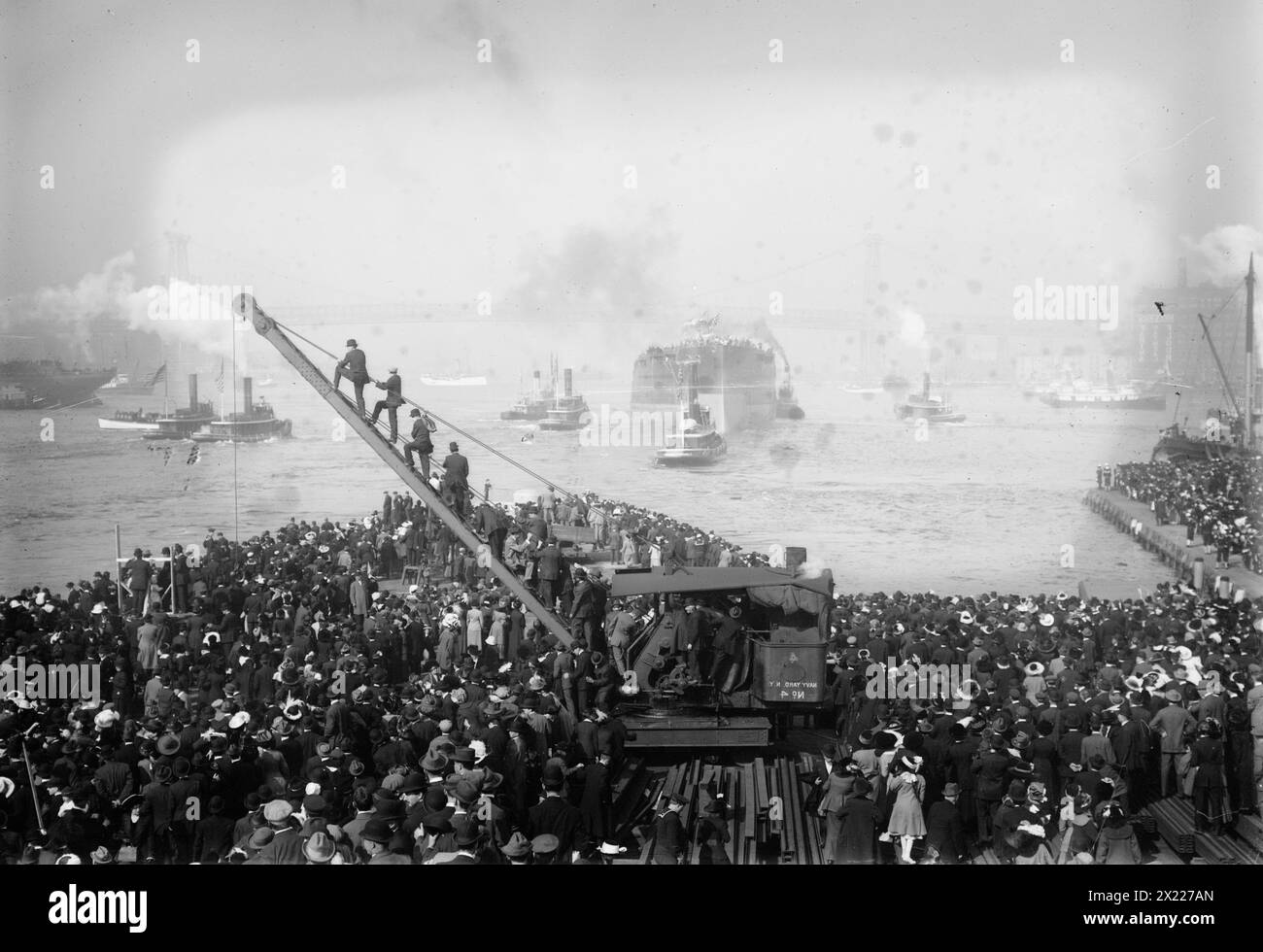 Launch of NEW YORK (reversed), 1912. Shows the crowd at the launching of the battleship the USS New York at the New York Navy Yard in Brooklyn, New York, October 30, 1912. Stock Photo