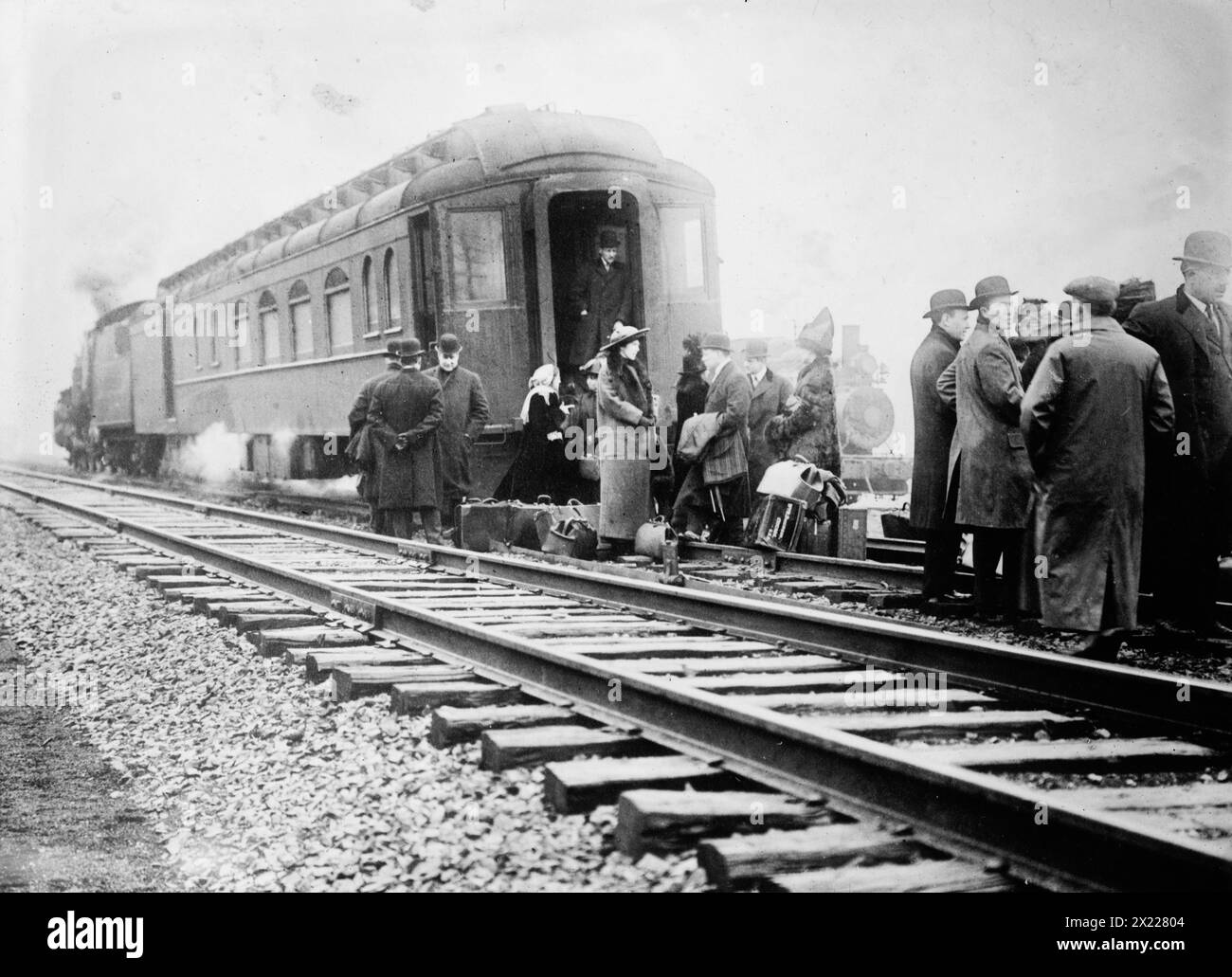 Remains of wrecked "20th C." [train], 1912. Shows passengers and crew