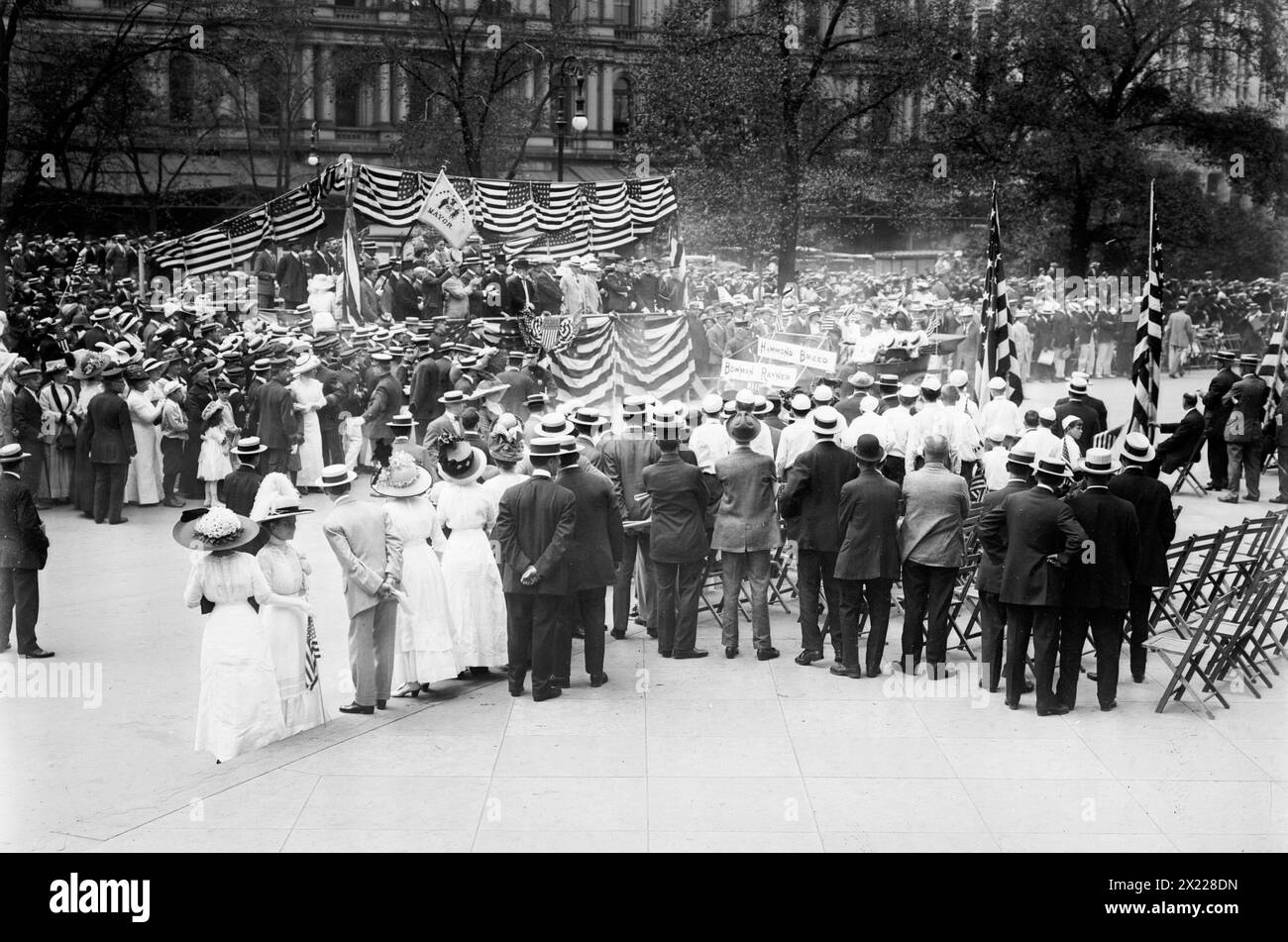 Mayor reviews Olympic Athletes, 1912. Showing Mayor William J. Gaynor and others at a parade greeting the U.S. athletes who competed in the 5th Olympic Games, held in Stockholm, Sweden in 1912. In the reviewing stand are Dr. George F. Kunz (in top hat) and (left to right from Kunz), Mayor William Gaynor; U.S. Olympic Commissioner James Edward Sullivan (1862-1914) and Justice Victor J. Dowling (1866-1934). Stock Photo