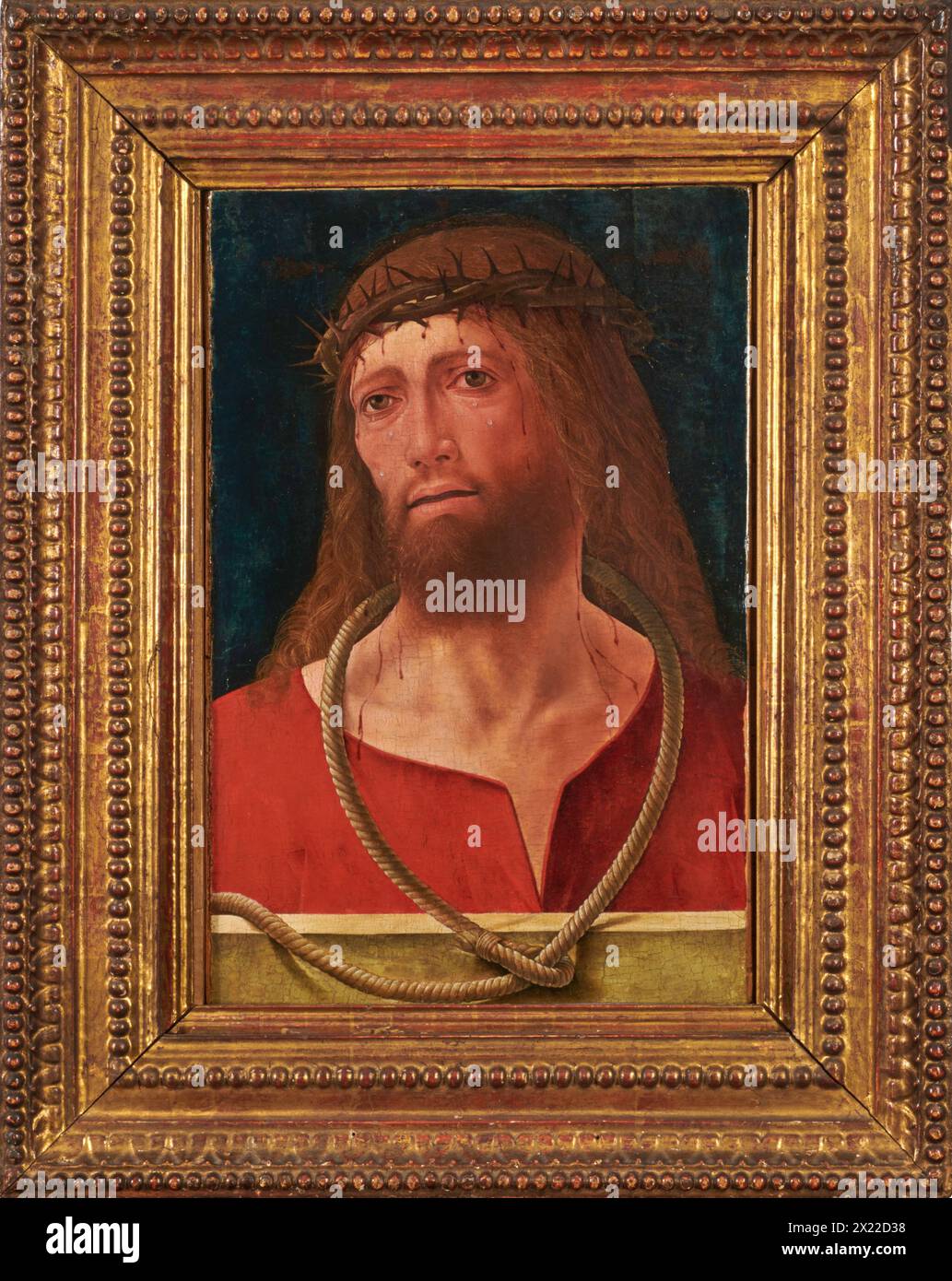 Christ Crowned With Thorns, c1479-80. Jesus is shown with a rope knotted around his neck and a crown of thorns on his head, tears and blood trickling down his face. This stark, iconic image was intended to encourage meditation on Christ&#x2019;s suffering, calling to mind his mockery and abuse at the hands of Roman soldiers. Stock Photo