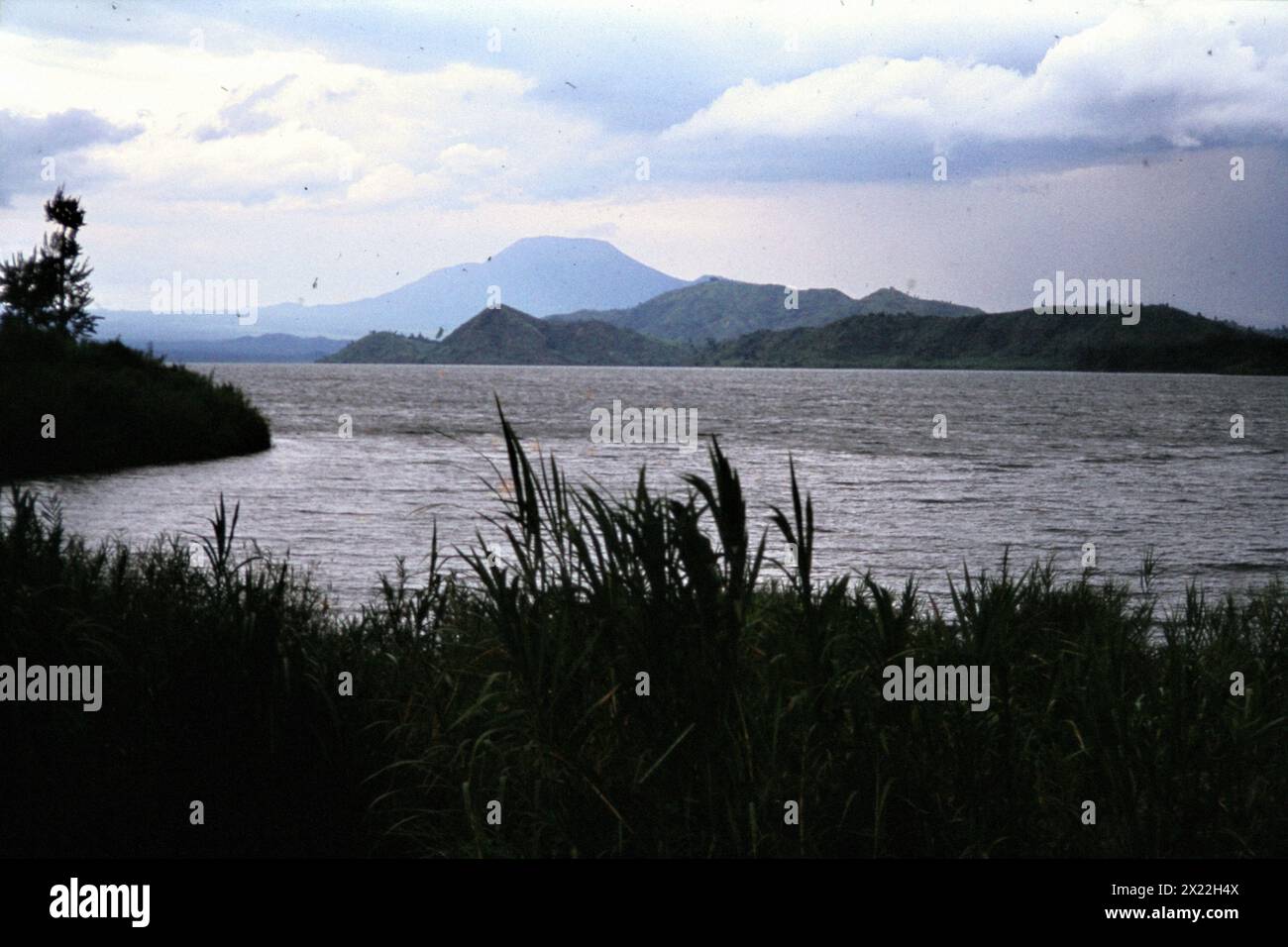 View over Lake Kivu to the volcano Nyiragonga. [automated translation ...