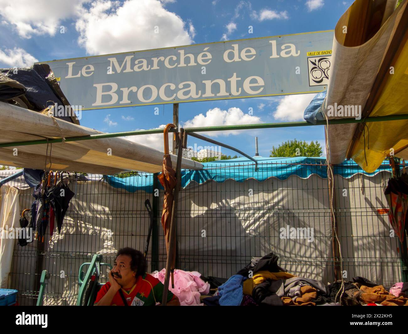 MONTREUIL (Paris), France, Brocante Sign, Street Scene, Man Selling Used Vintage Clothing in Flea Market, Suburbs, Stock Photo