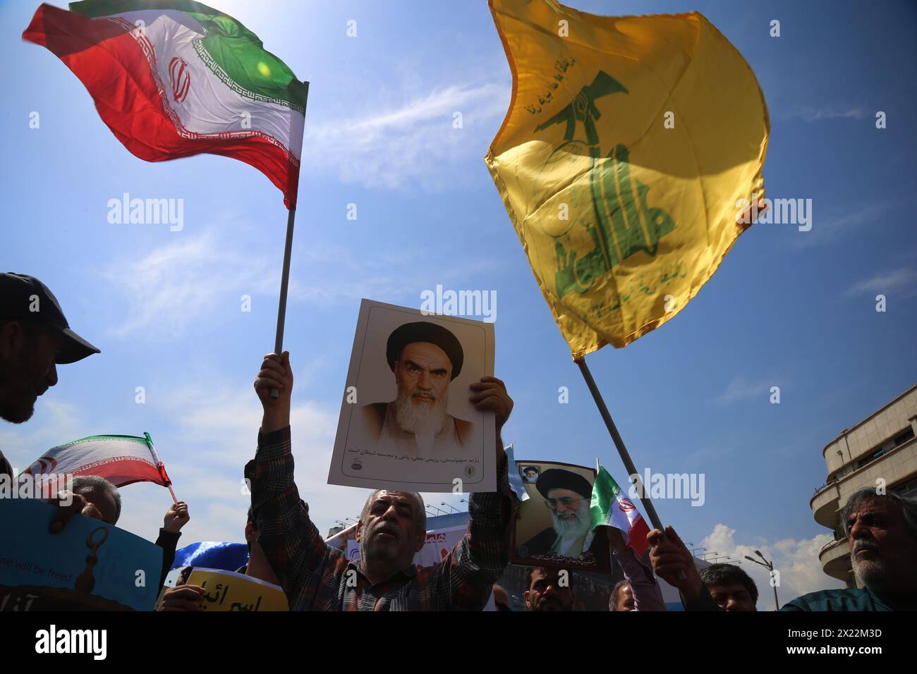 April 19, 2024, Tehran, Iran Iranians carrying placards and portraits of the Iranian former