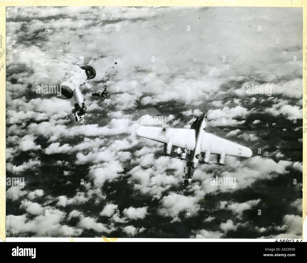 1945 - B-24 Liberator participating in attack on submarine yards at Keil and Hamburg is destroyed. Approximately 1000 heavy bombers escorted by 850 P-51s and P-47s were involved in this raid. Nine bombers and four fighters reported missing. Stock Photo