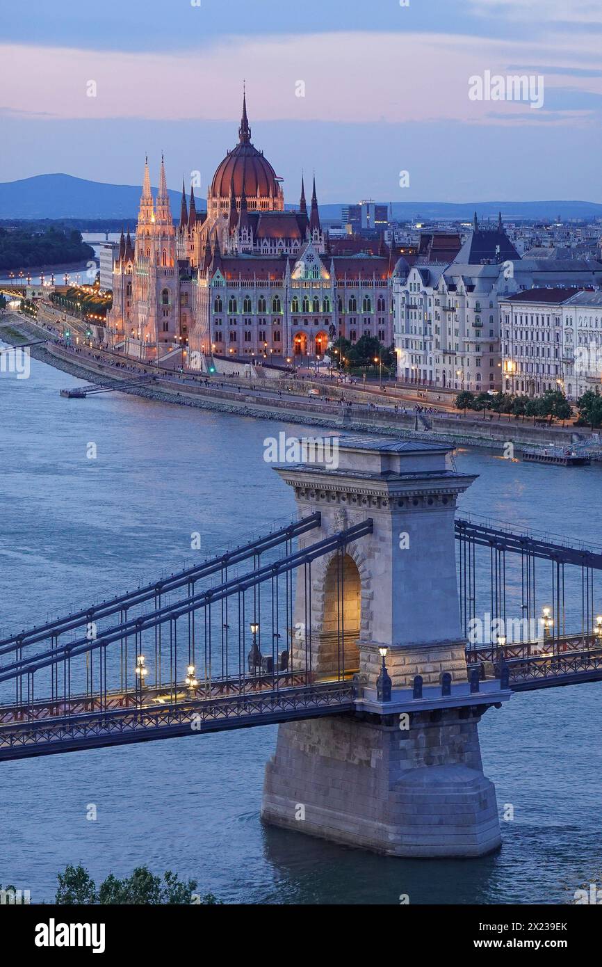 Hungary, Budapest, Aerial cityscape image of Budapest with the illuminated Szechenyi Chain Bridge and parliament building. Designed by English enginee Stock Photo