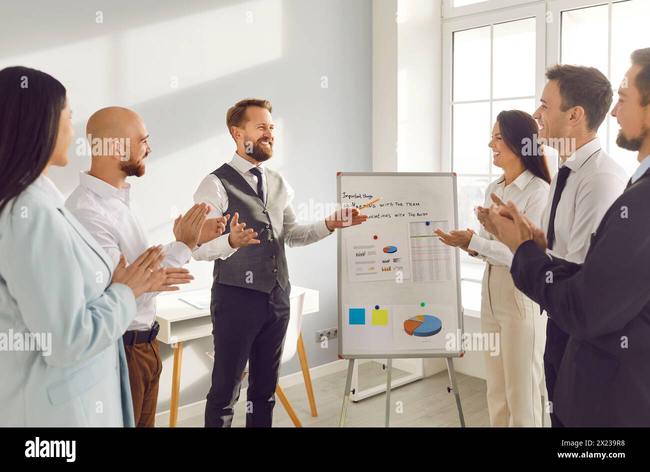 Office presentation, businessman presenting new project, result to business partners  Stock Photo