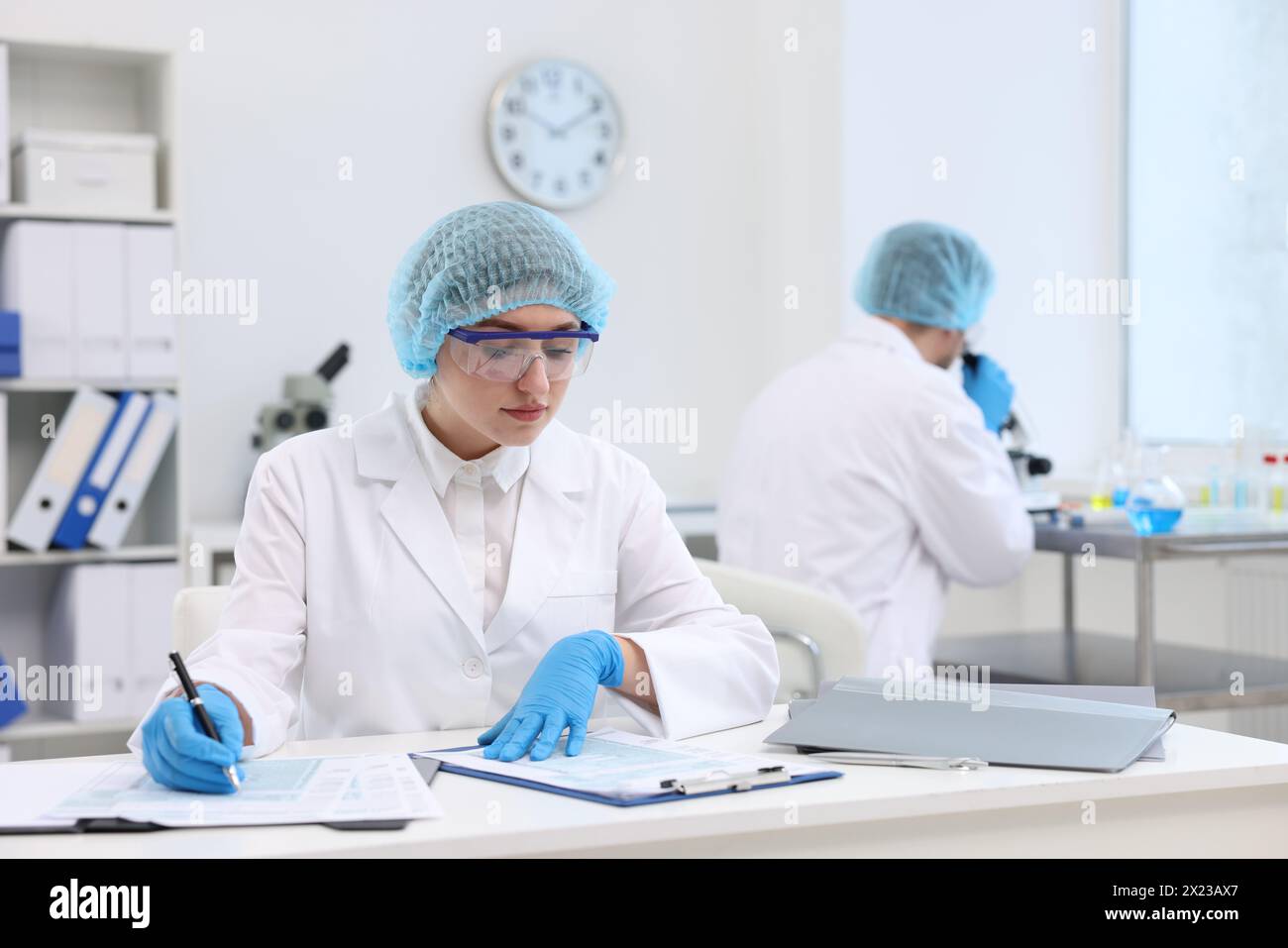 Quality control. Food inspectors checking safety of products in ...