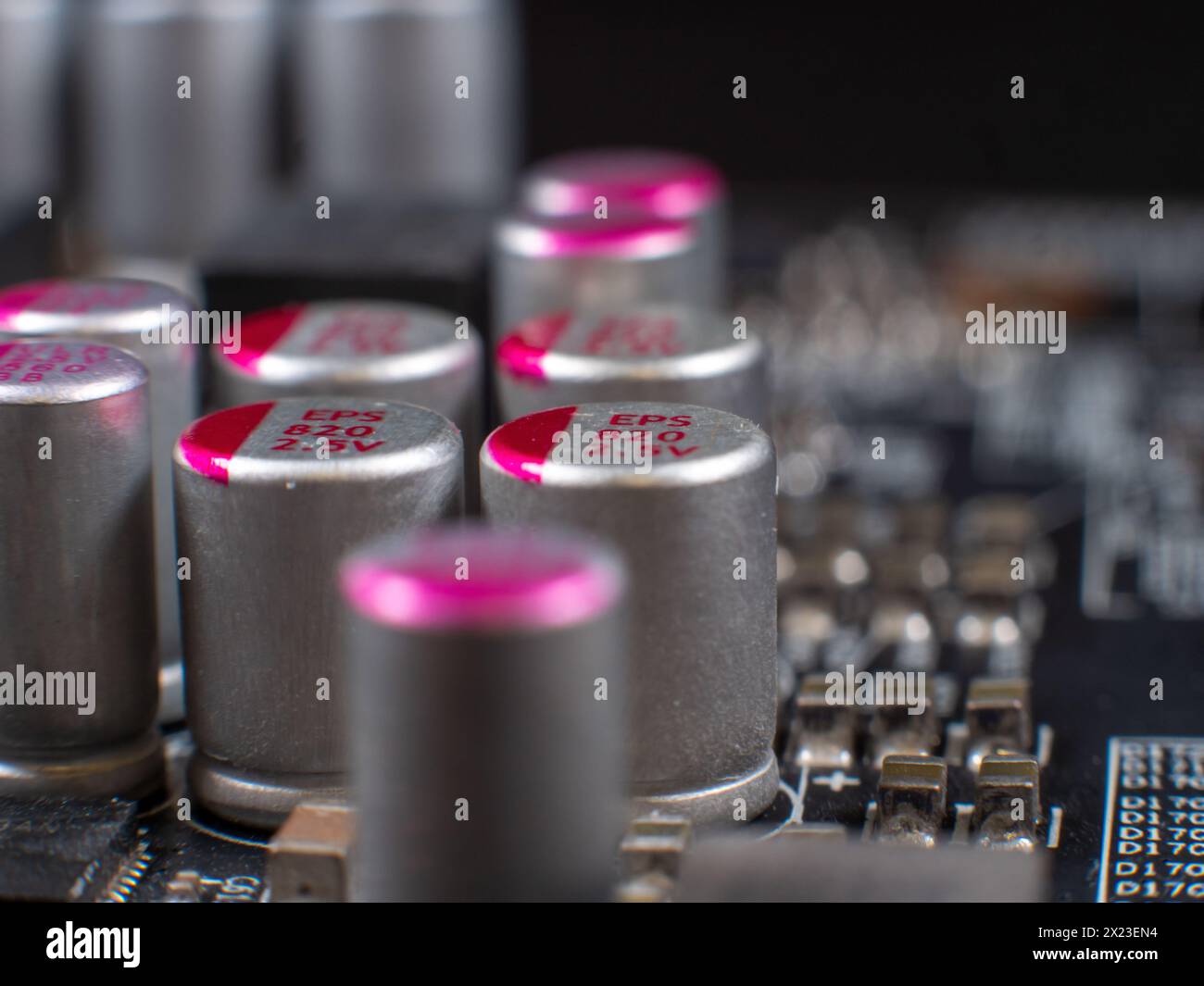 A close-up of a printed circuit board and small components, of which there is a severe shortage in industry Stock Photo