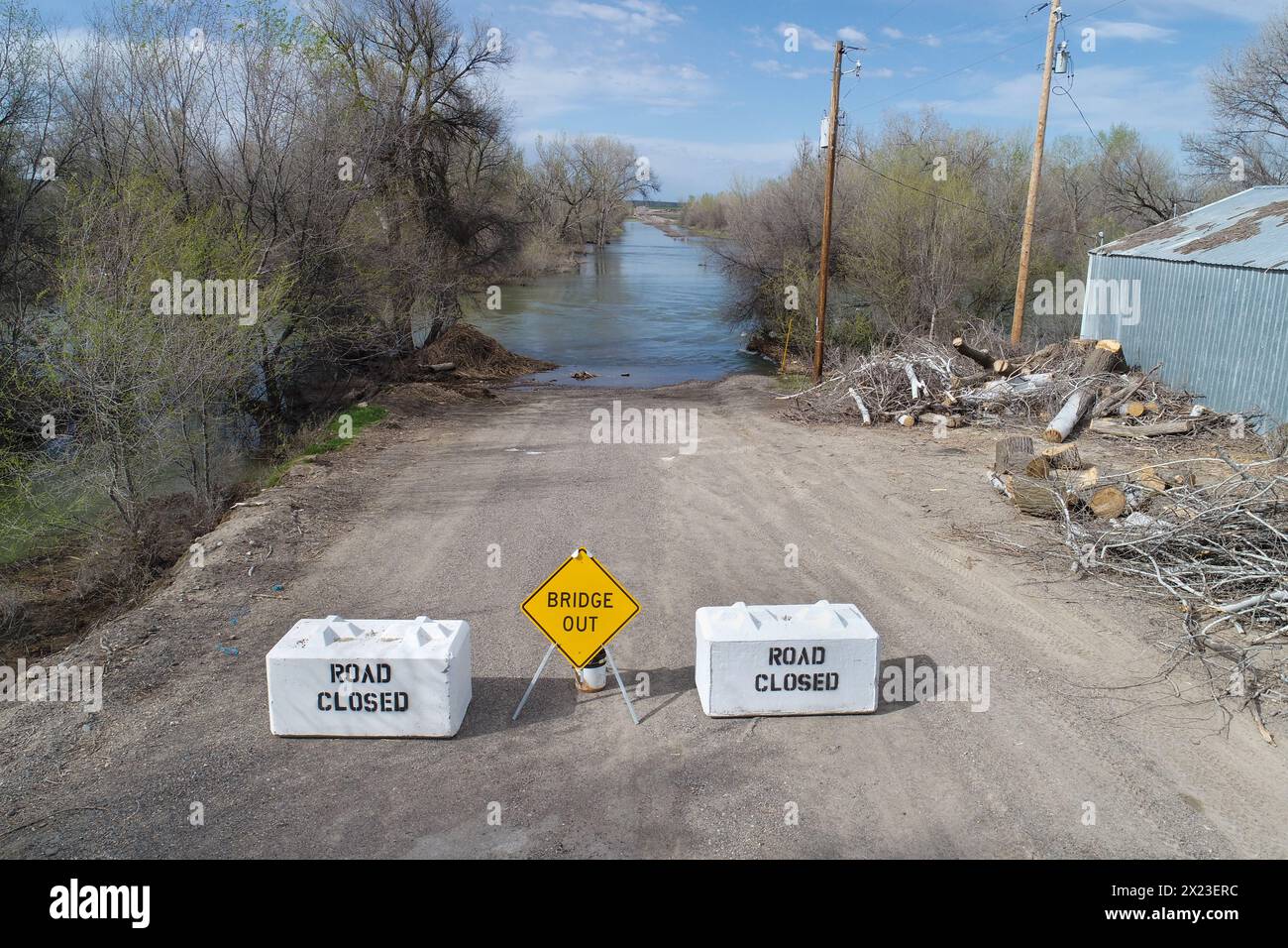 Flooded road with closed sign Stock Photo - Alamy