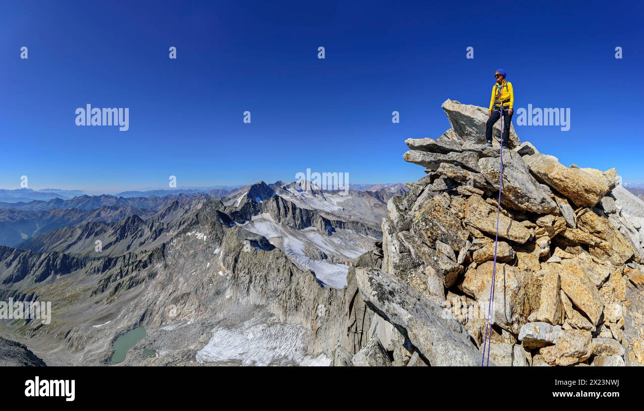 Women Ridge Panorama with woman mountaineering standing on rocky ridge, main ...