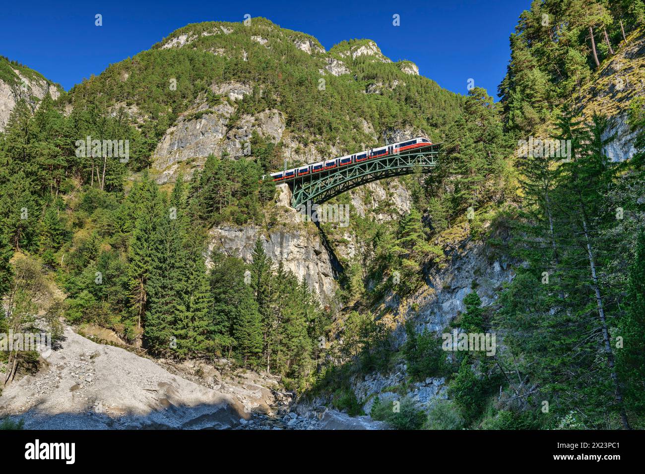 Train runs over Schlossbachklamm Viaduct, Karwendelbahn, Mittenwaldbahn, Tyrol, Austria Stock Photo