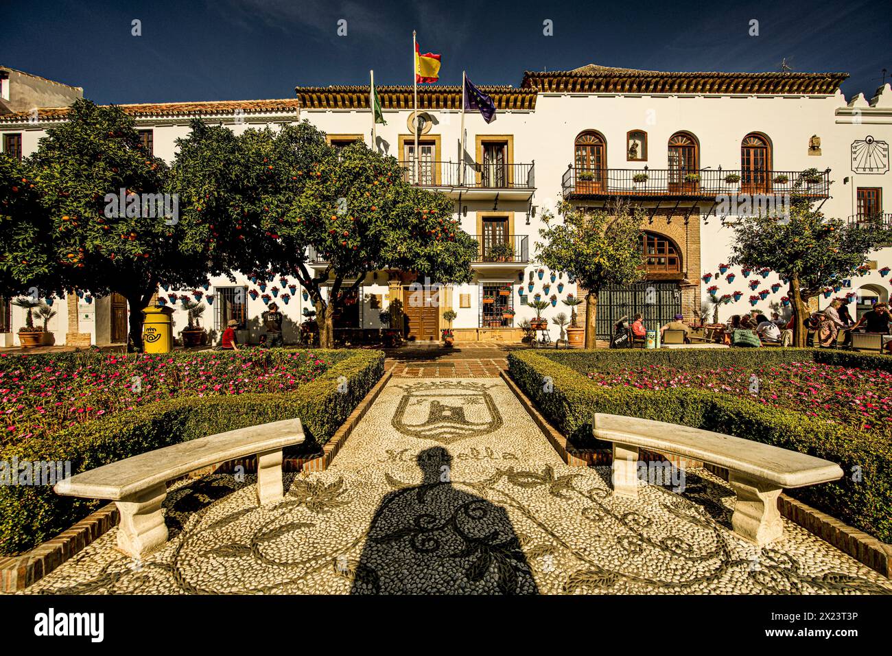 Plaza de los Naranjos in the old town of Marbella with view to the town hall, silhouette of the bust of King Juan Carlos in the foreground, Costa del Stock Photo