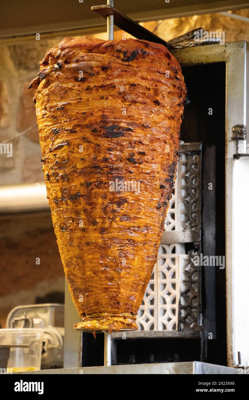 Taco al pastor trompo de pastor street food. Trompo de pastor in street