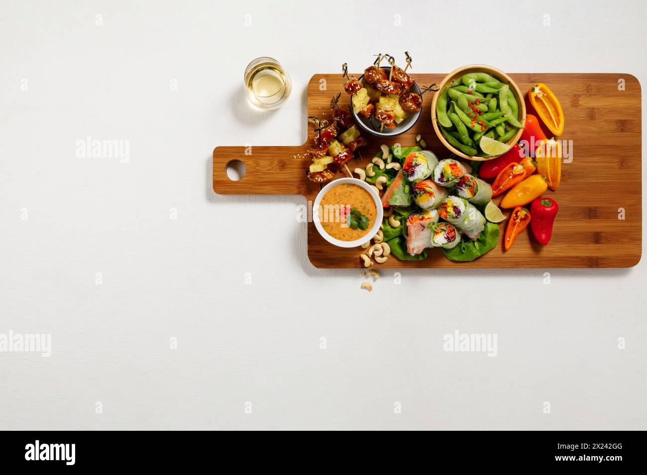 Asian finger food board with mini spring rolls Stock Photo