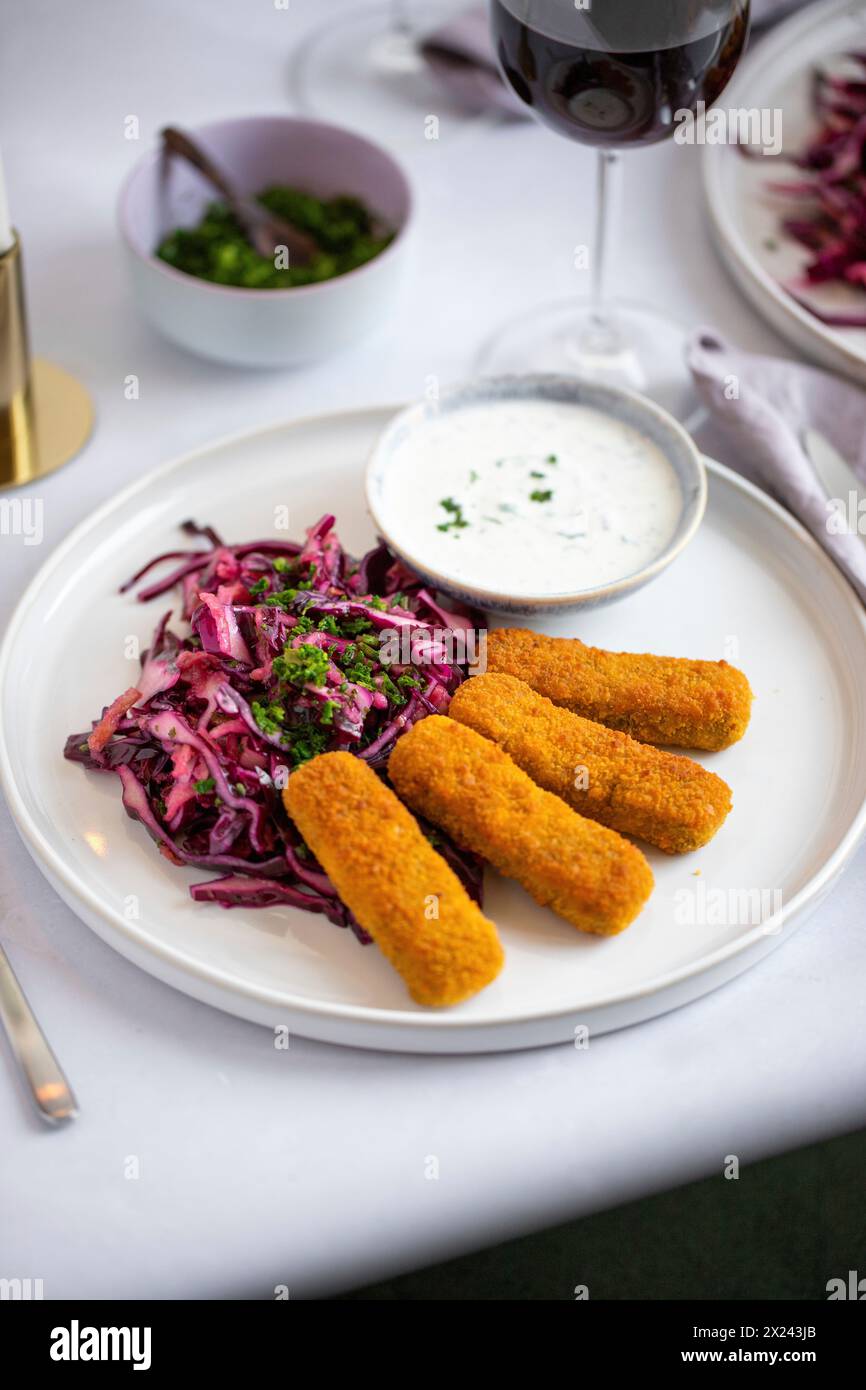 Breaded vegetable sticks with red cabbage salad Stock Photo