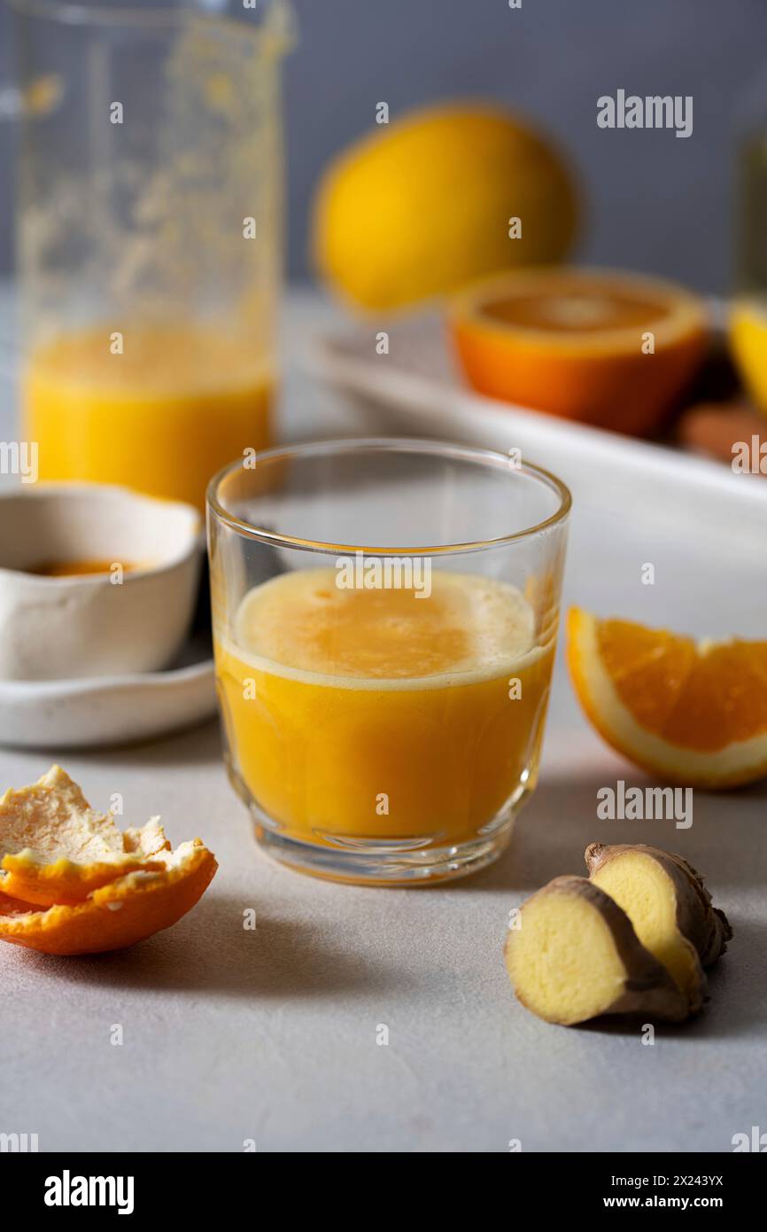 Immune-boosting citrus ginger shot Stock Photo