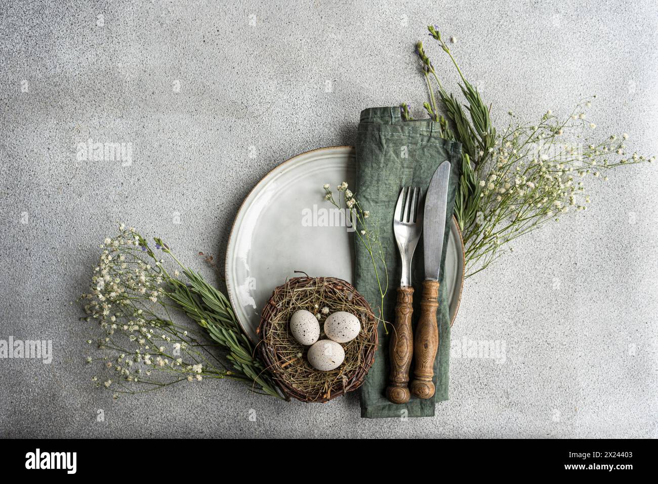 Festive Easter cake with nest and eggs Stock Photo
