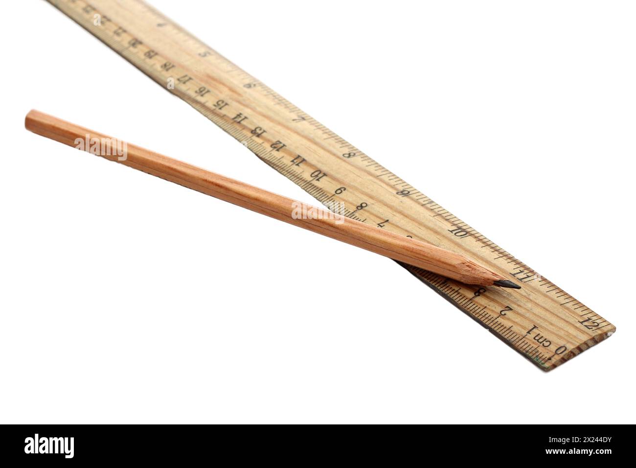 Wooden ruler and pencil on white background Stock Photo - Alamy