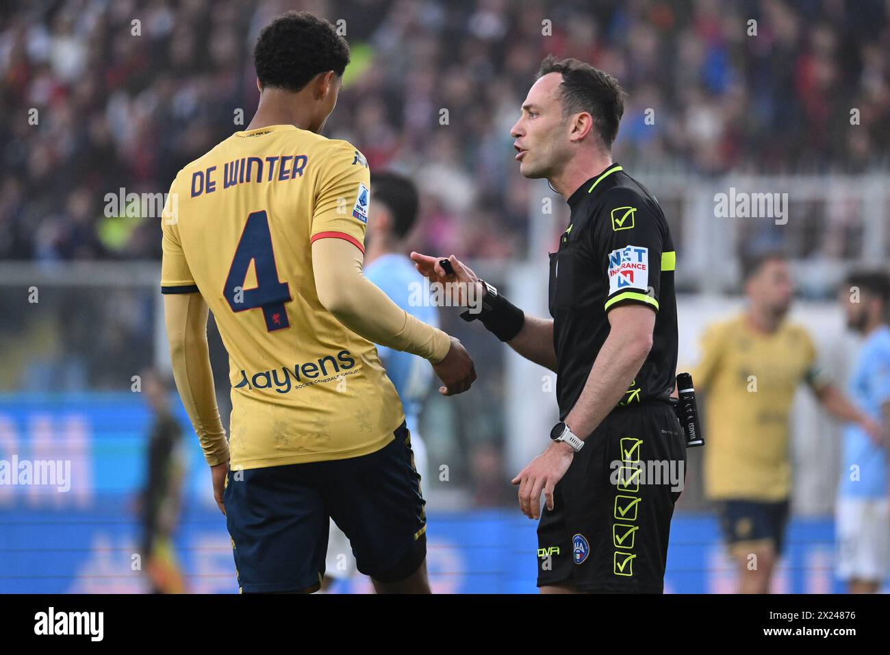 Genoa, Italy. 19th Apr, 2024. Koni De Winter of Genoa C.F.C. and Referee Ermanno Feliciani during the 33th day of the Serie A Championship between Genoa C.F.C. vs S.S. Lazio at Stadio Luigi Ferraris on April 19, 2024 in Genoa, Italy. Credit: Independent Photo Agency/Alamy Live News Stock Photo