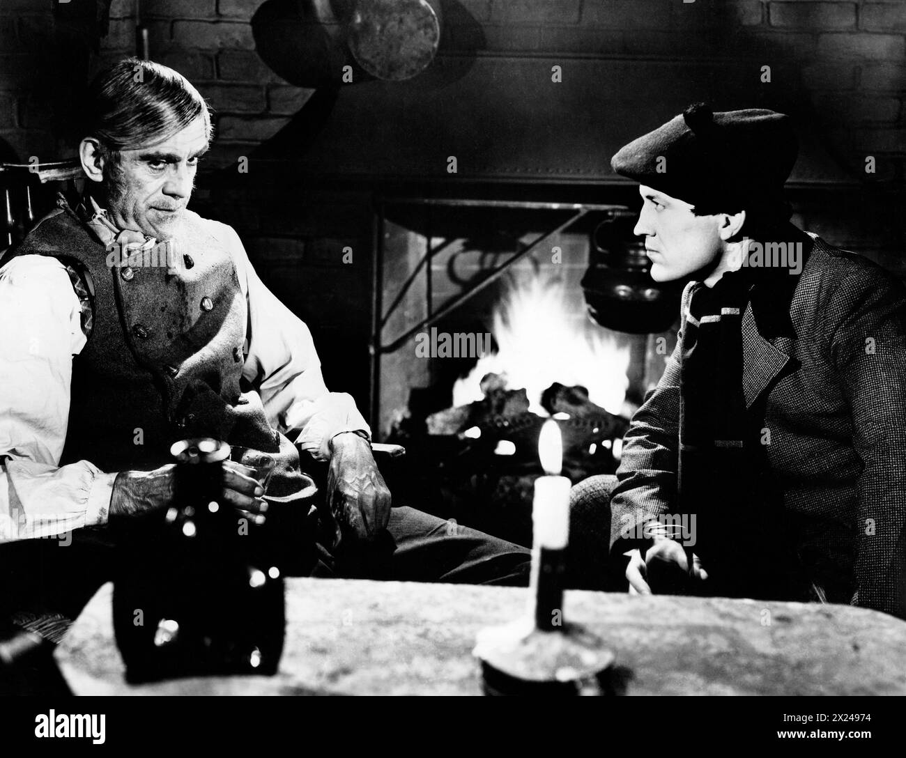 Boris Karloff, Russell Wade, on-set of the film, 'The Body Snatcher', RKO Radio Pictures, 1945 Stock Photo