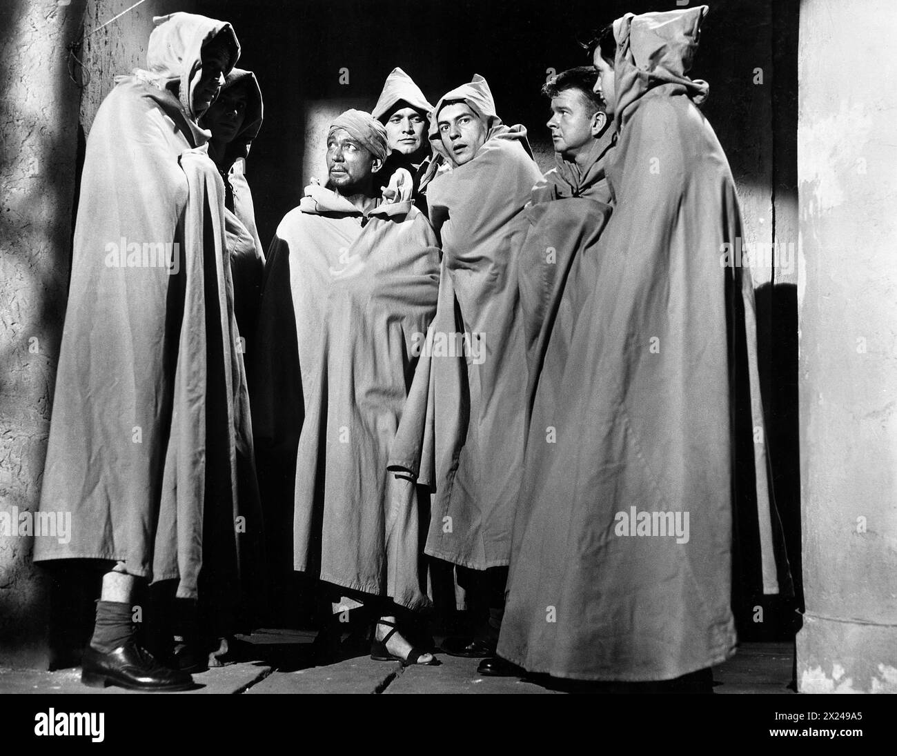 James Dobson, David Janssen, Jack Kelly, Marshall Thompson, Leonard Strong, William Reynolds, Richard Long, on-set of the film, 'Cult Of The Cobra', Universal Pictures, 1955 Stock Photo