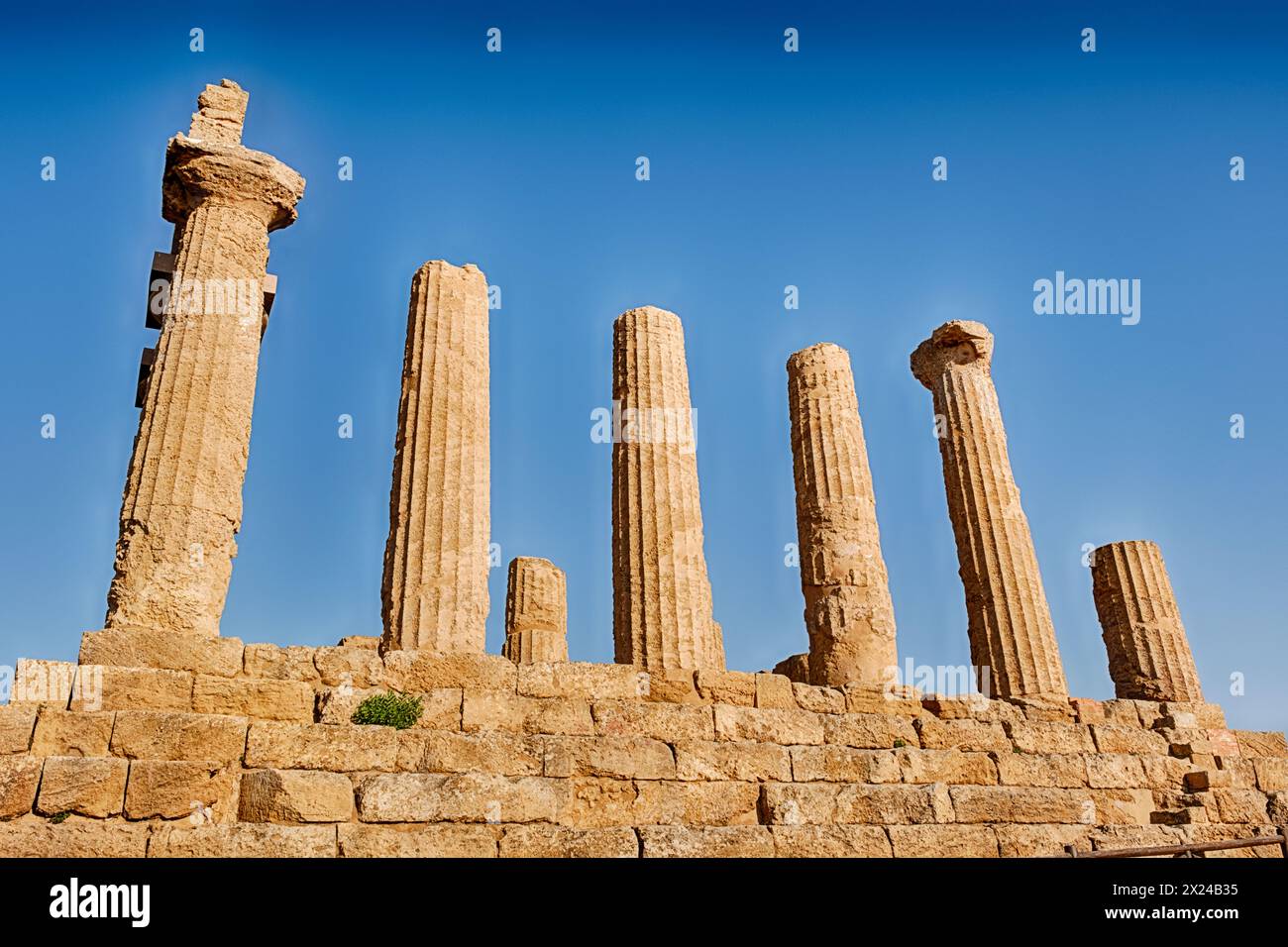 Some of the columns remain standing at the Temple of Juno at the Valley Of The Temples near Agrigento on Sicily. Stock Photo