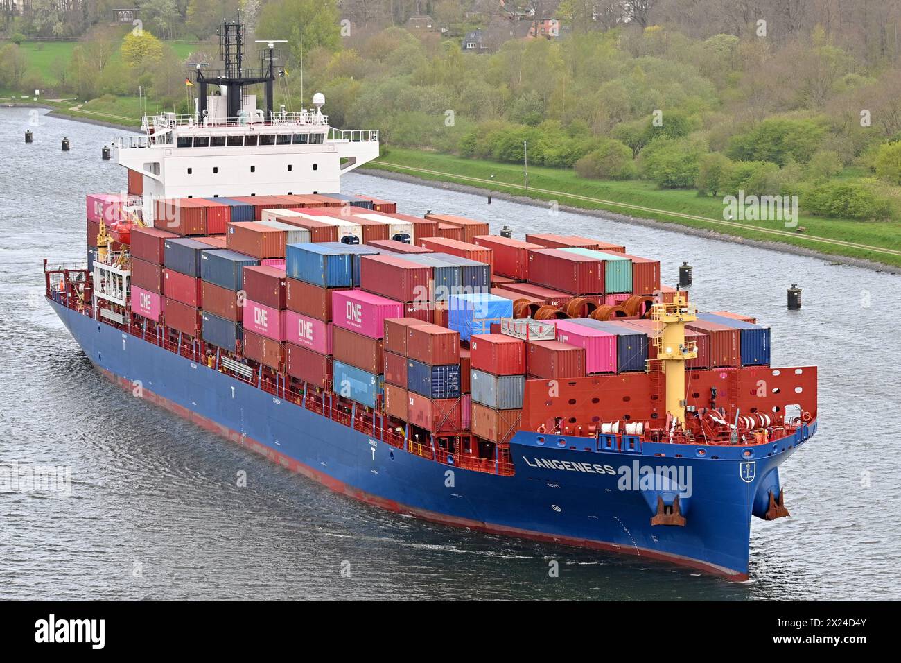 Containership LANGENESS passing the Kiel Canal Stock Photo