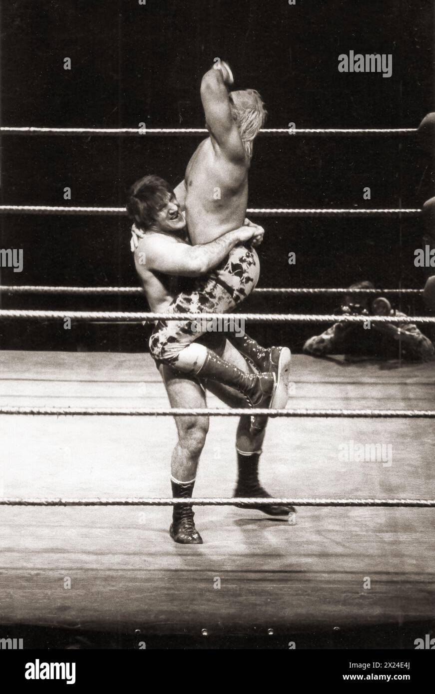 Strongmen Bruno Sammartino & Superstar Billie Graham during a match at the Nassau Coliseum on Long Island. In the mid 1970s. Stock Photo