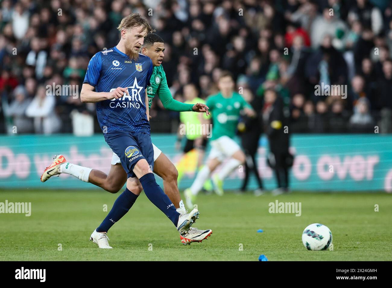 Lommel, Belgium. 19th Apr, 2024. Beveren's Jakov Filipovic and Lommel's Gabriel Diego Silva Rosa fight for the ball during a soccer match between Lommel SK and SK Beveren, Friday 19 April 2024 in Lommel, on the last day of the 2023-2024 'Challenger Pro League' second division of the Belgian championship. BELGA PHOTO BRUNO FAHY Credit: Belga News Agency/Alamy Live News Stock Photo