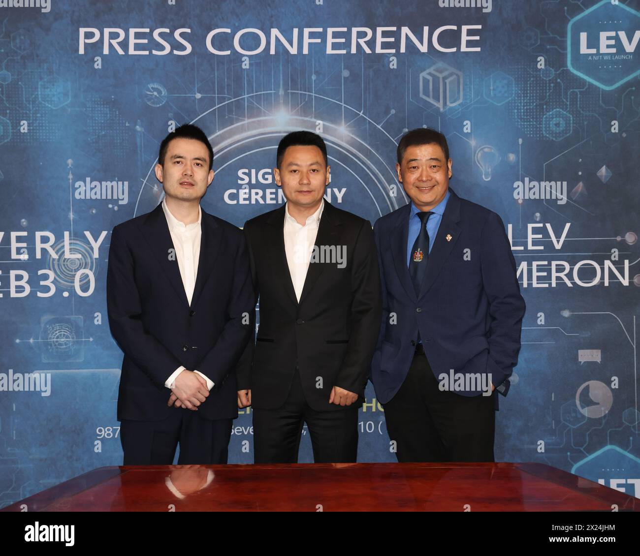Beverly Hills, California, USA. 17th April, 2024. Charles Yu, Investor of Beverly Web3.0, Peter Zhang, President of Beverly Web3.0, and TV host Joey Zhou, CEO of Beverly Web3.0, attending the Beverly Web3.0 and Lev Cameron NFT Launch Press Conference at the Beverly Hilton Hotel in Beverly Hills, California. Credit: Sheri Determan Stock Photo