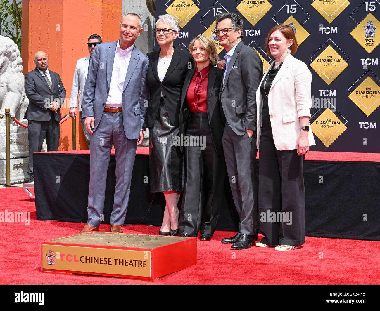 April 19, 2024, Hollywood, California, U.S.: (L-R) Charlie Tabesh, SVP, Programming and Content Strategy, TCM, Jamie Lee Curtis, Jodie Foster,.TCM Host Ben Mankiewicz, and Genevieve McGillicuddy, Executive Festival Director, TCM Classic Film Festival attend the TCM Hosts Handprint And Footprint Ceremony Honoring Jodie Foster At TCL Chinese Theatre IMAX. (Credit Image: © Billy Bennight/ZUMA Press Wire) EDITORIAL USAGE ONLY! Not for Commercial USAGE! Stock Photo
